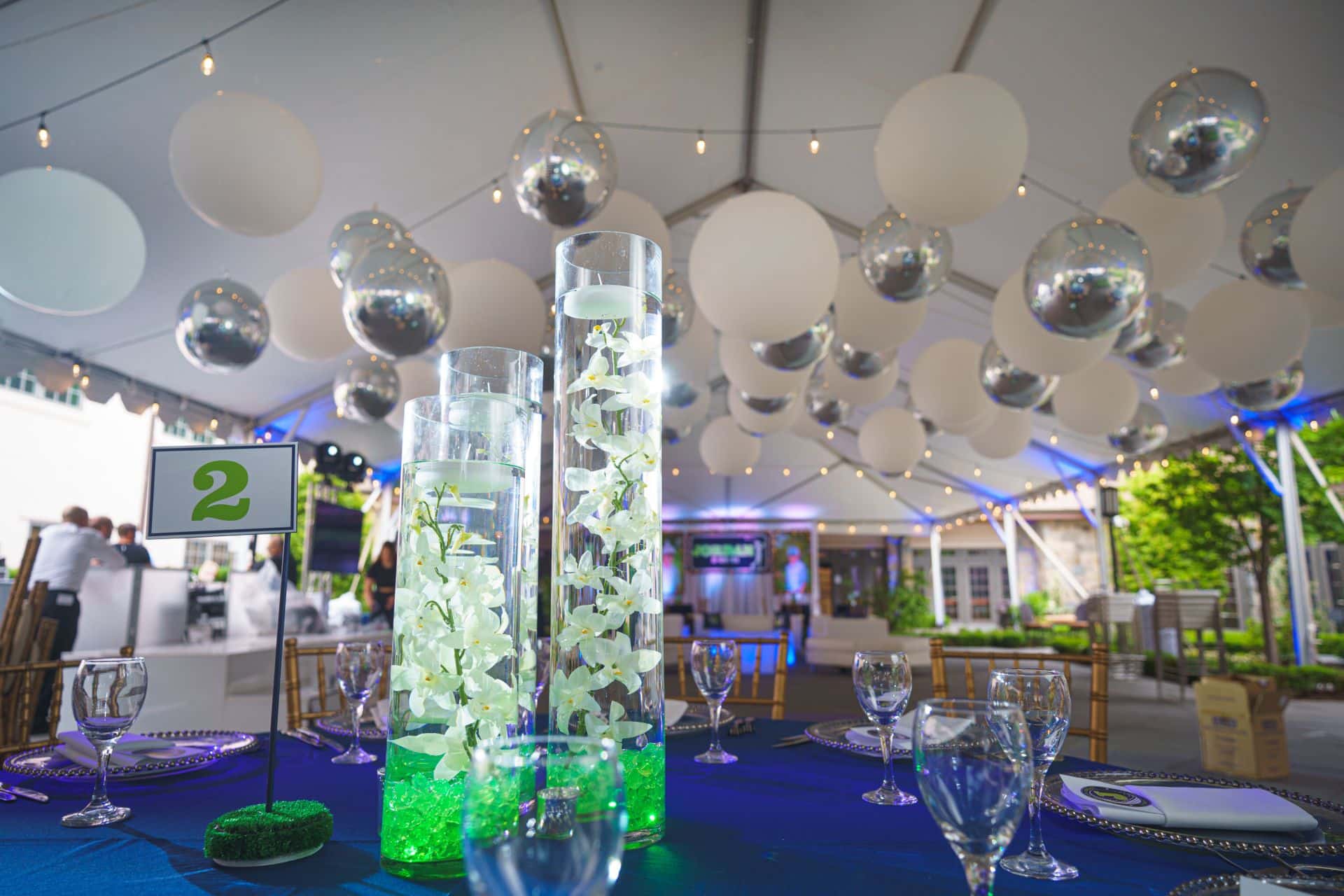 Stunning Orchid Centerpiece with Floating Candles and Chips for Bar Mitzvah