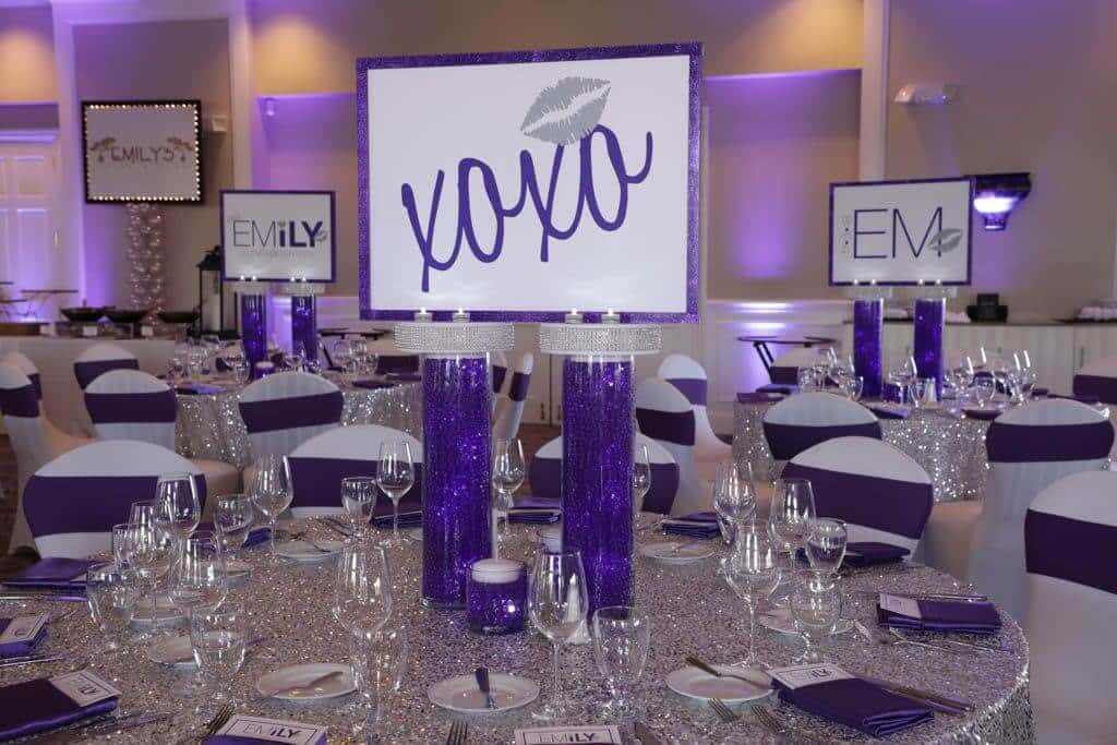 Custom Logo Centerpiece with Glittered Border and LED Aqua Gems Cylinders for Purple Themed Bat Mitzvah