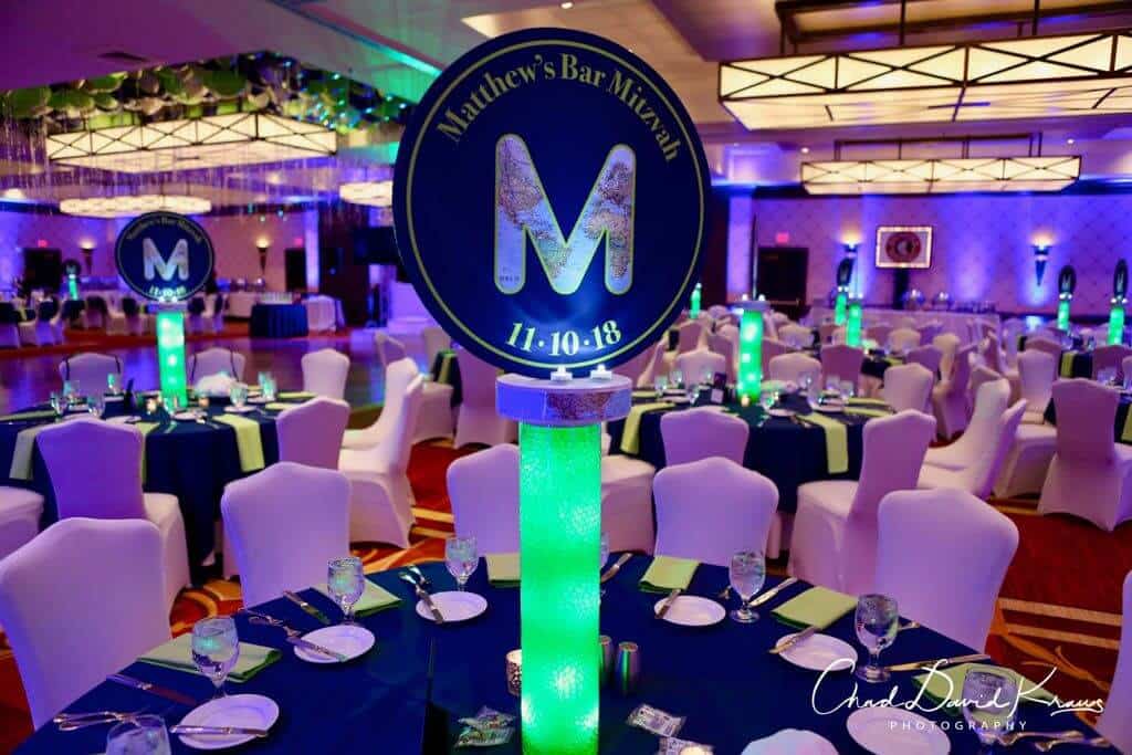 Travel Themed Logo Centerpiece on LED Vase with Gems