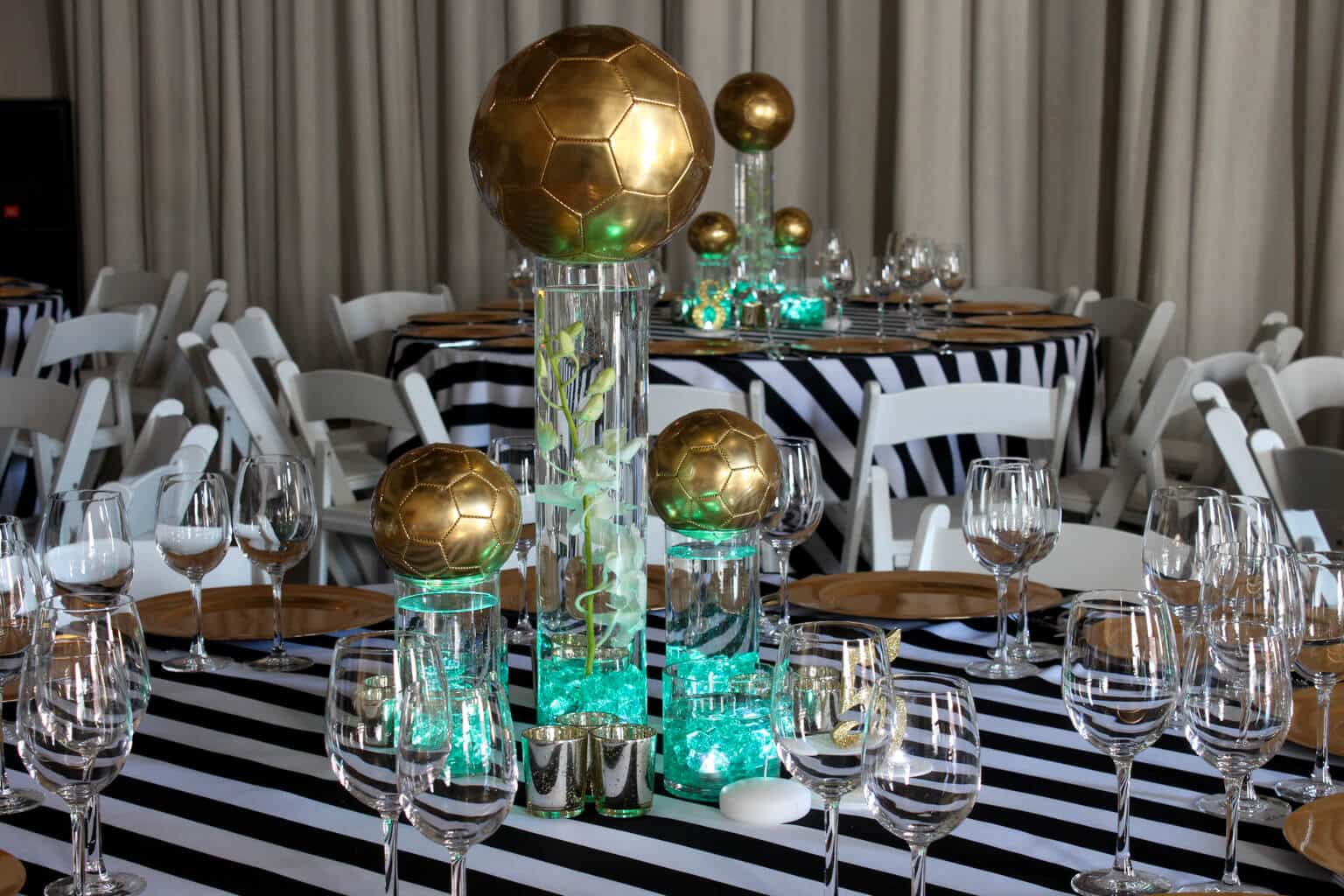 Gold Soccer Ball Centerpiece with LED Lighting, Orchids and LED Tea Lights