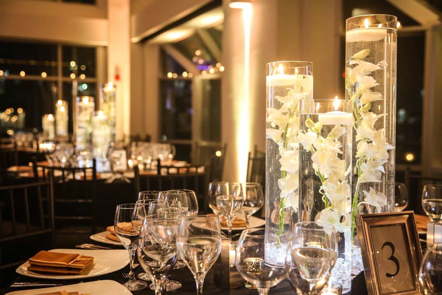LED Orchid Centerpieces with Clear Chips, White Orchids and Gold Votives