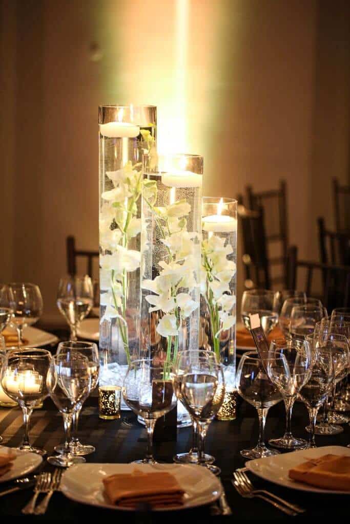 LED Orchid Centerpieces with Clear Chips, White Orchids and Gold Votives