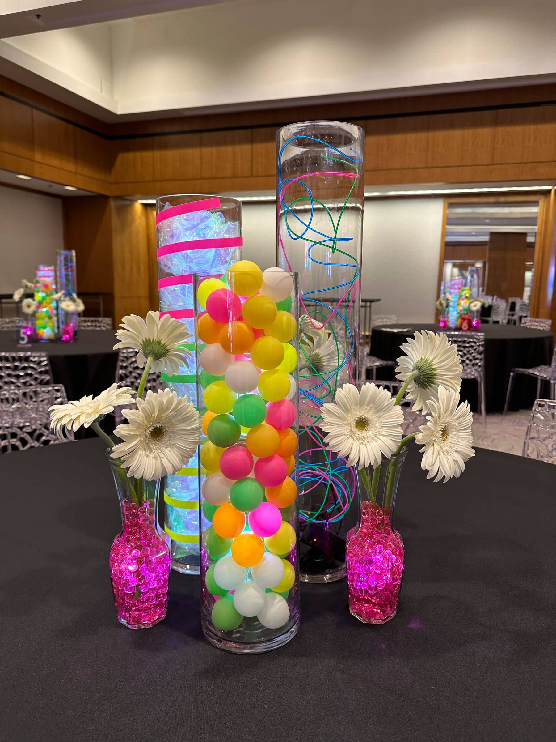 Neon Themed Bat Mitzvah Centerpiece with Neon Balls, Wire, Tape & Gerber Daisy