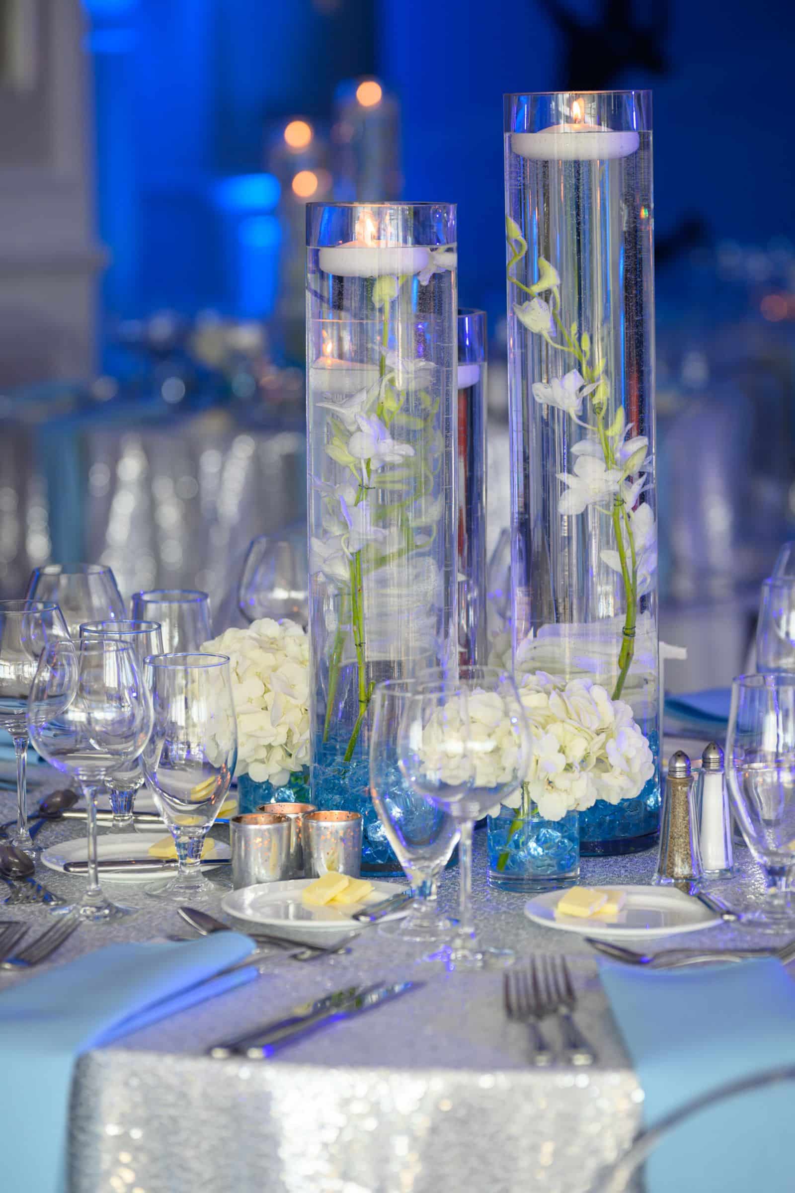 LED Orchid and Hydrangea Centerpiece with Blue Chips and Silver Votives