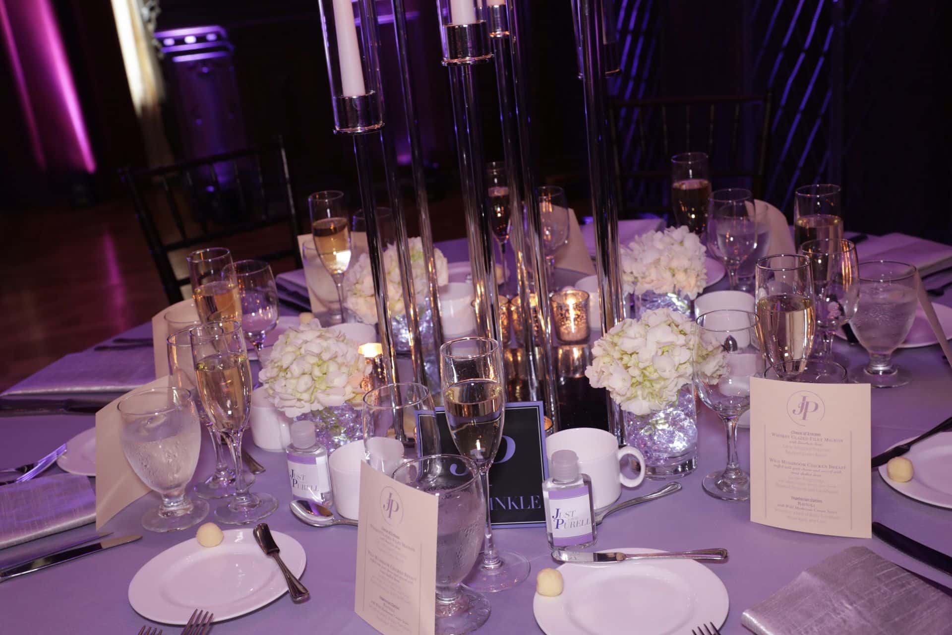 Candelabra Centerpiece with Floral Accents and Votives at Reid Castle