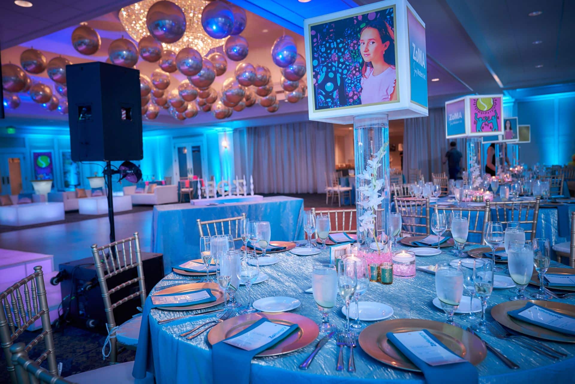 Art Theme Lampshade Centerpieces and Gold Orbz Ceiling Treatment at Country House at Bluestone