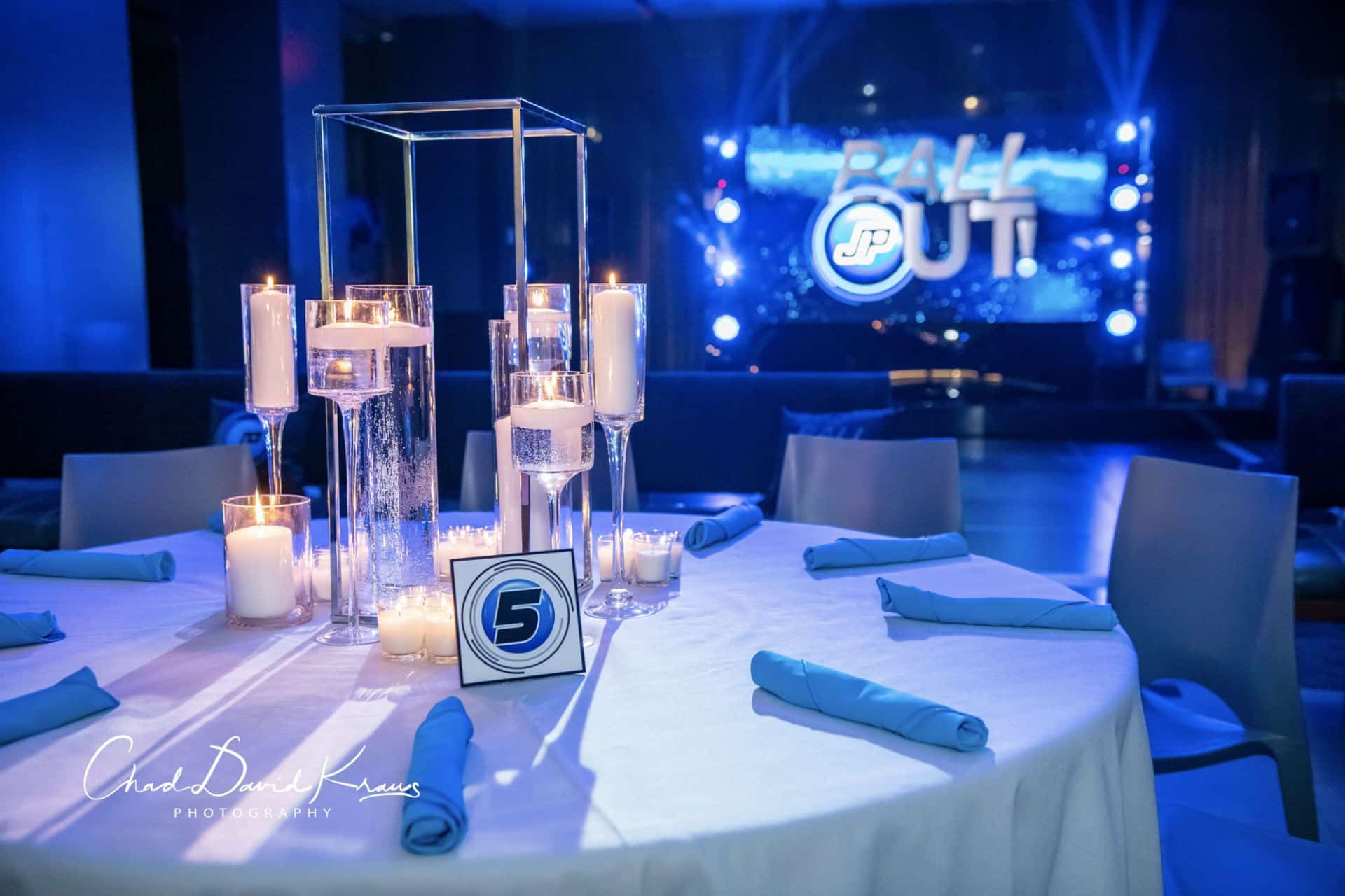 Bar Mitzvah Centerpieces with Floating Candles and Hurricane Vases