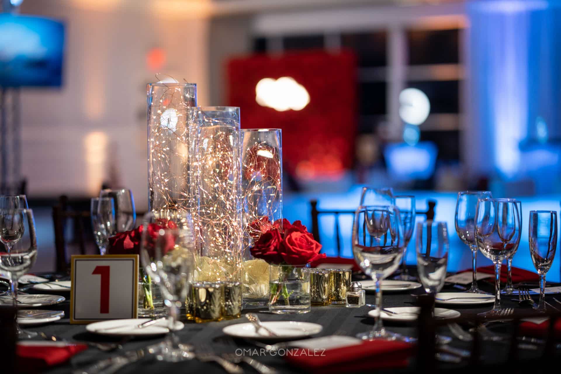Fairy Light Floral Centerpiece with Red Roses and Gold Votives