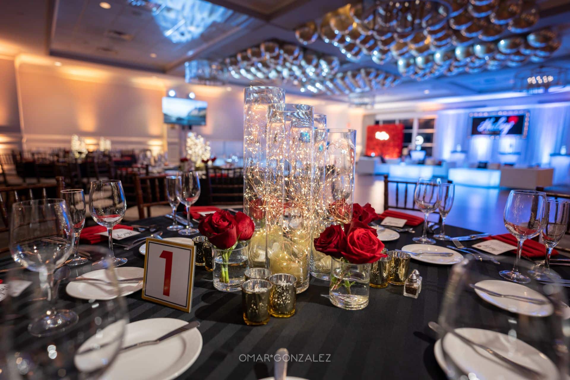 Fairy Light Centerpiece with Red Roses and Gold Votives
