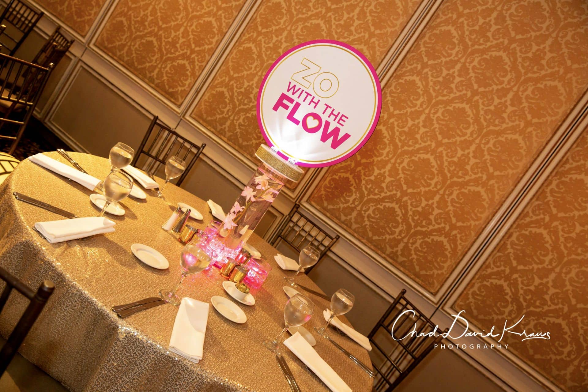 LED Logo Centerpiece with Orchids and Floating Candles