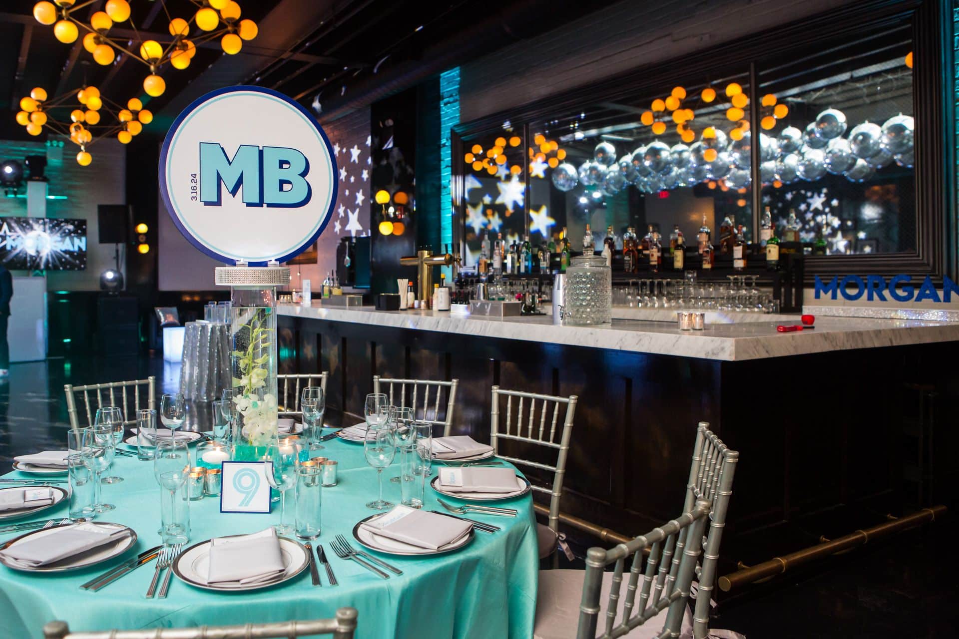 Custom Logo Topper with Orchid Centerpiece for a Bat Mitzvah