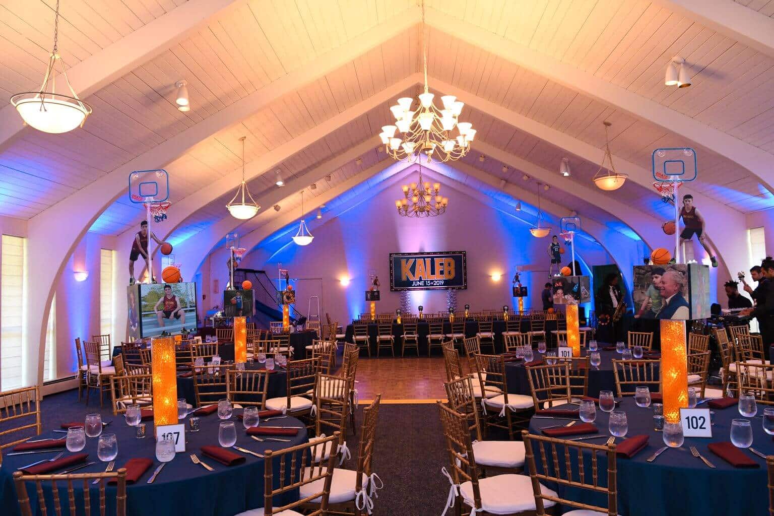 Cleveland Caveliers Themed Bar Mitzvah with Custom LED Centerpieces, Logo Backdrop and Uplighting at Temple Beth Sholom