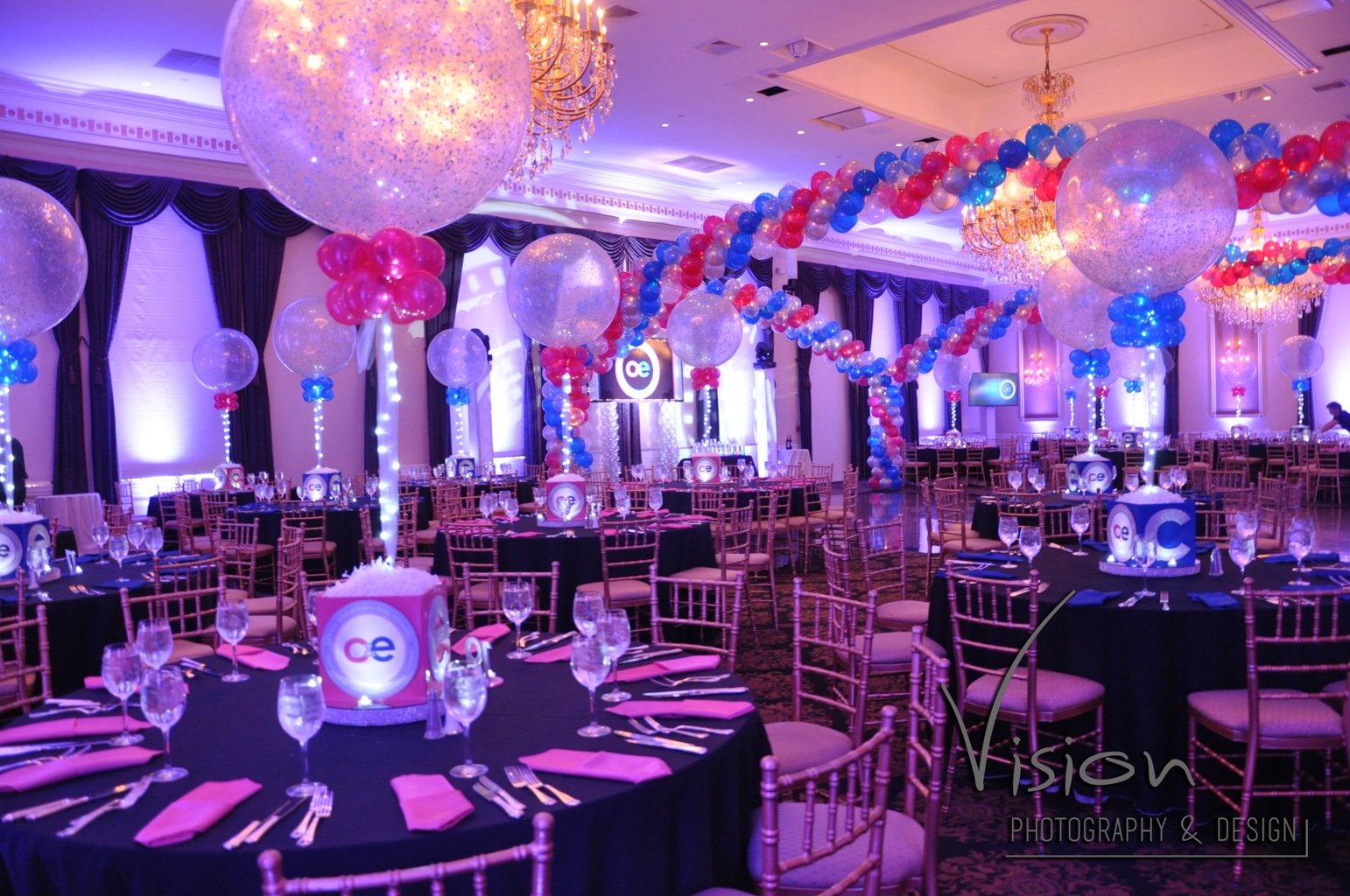 Bnai Mitzvah with Alternating Blue and Pink Centerpieces, Wrap around Dance Floor and Custom Backdrop at Florentine Gardens