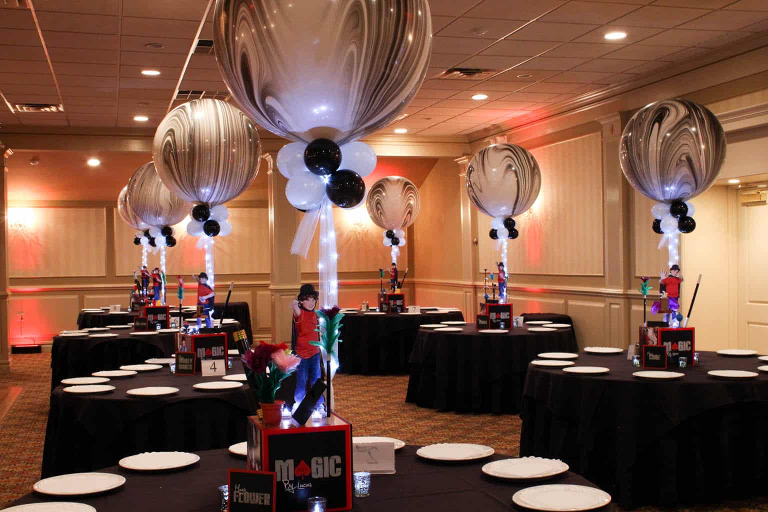 Magic Themed Bar Mitzvah with Custom Themed Centerpieces and Black and White Marble Balloons at Town and Country, Congers, NY