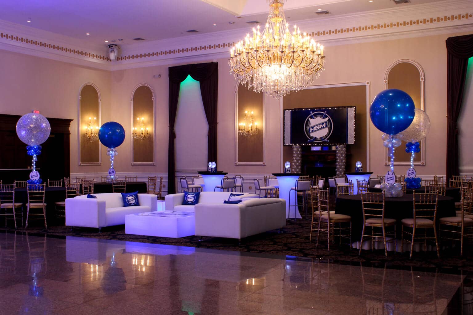 Hockey Themed Bar Mitzvah with Custom Lounge Setup, Balloon Centerpiece and Logo Backdrop at Florentine Gardens