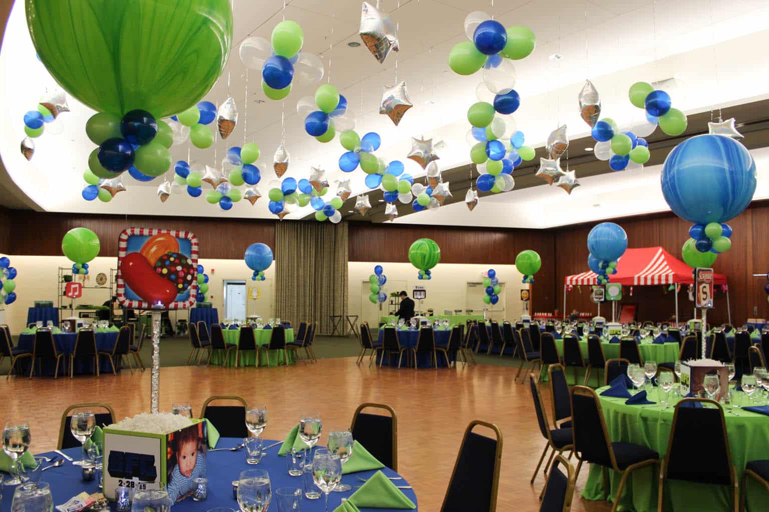 App Themed Bar Mitzvah with Alternating Blue and Green Marble Balloons and Clusters and Dazzle Stars over Dance Floor