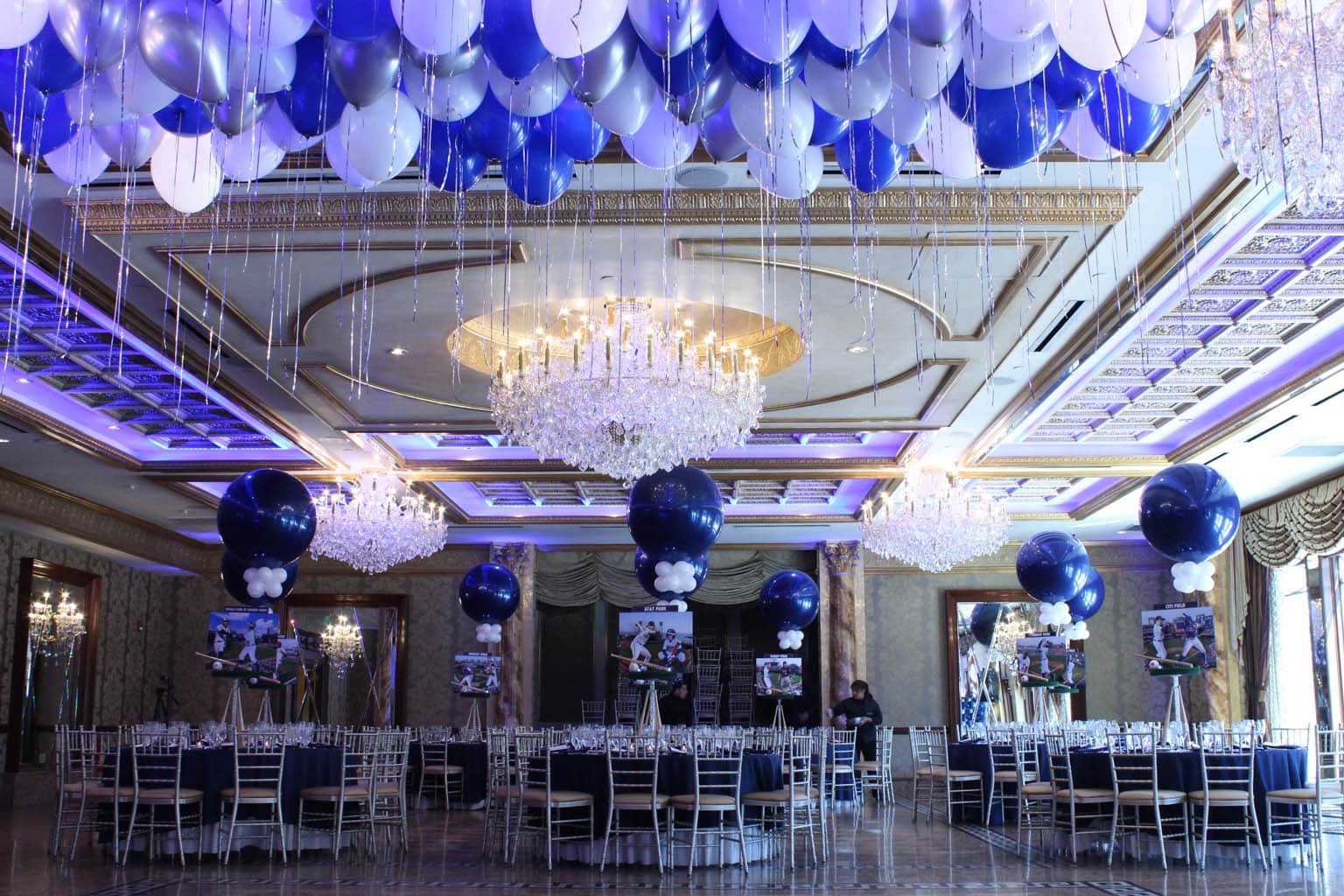 Baseball Themed Bar Mitzvah with Stadium Diorama Centerpieces, Navy and White 36" Balloons and Loose Balloons over the Dance Floor at Seasons Catering