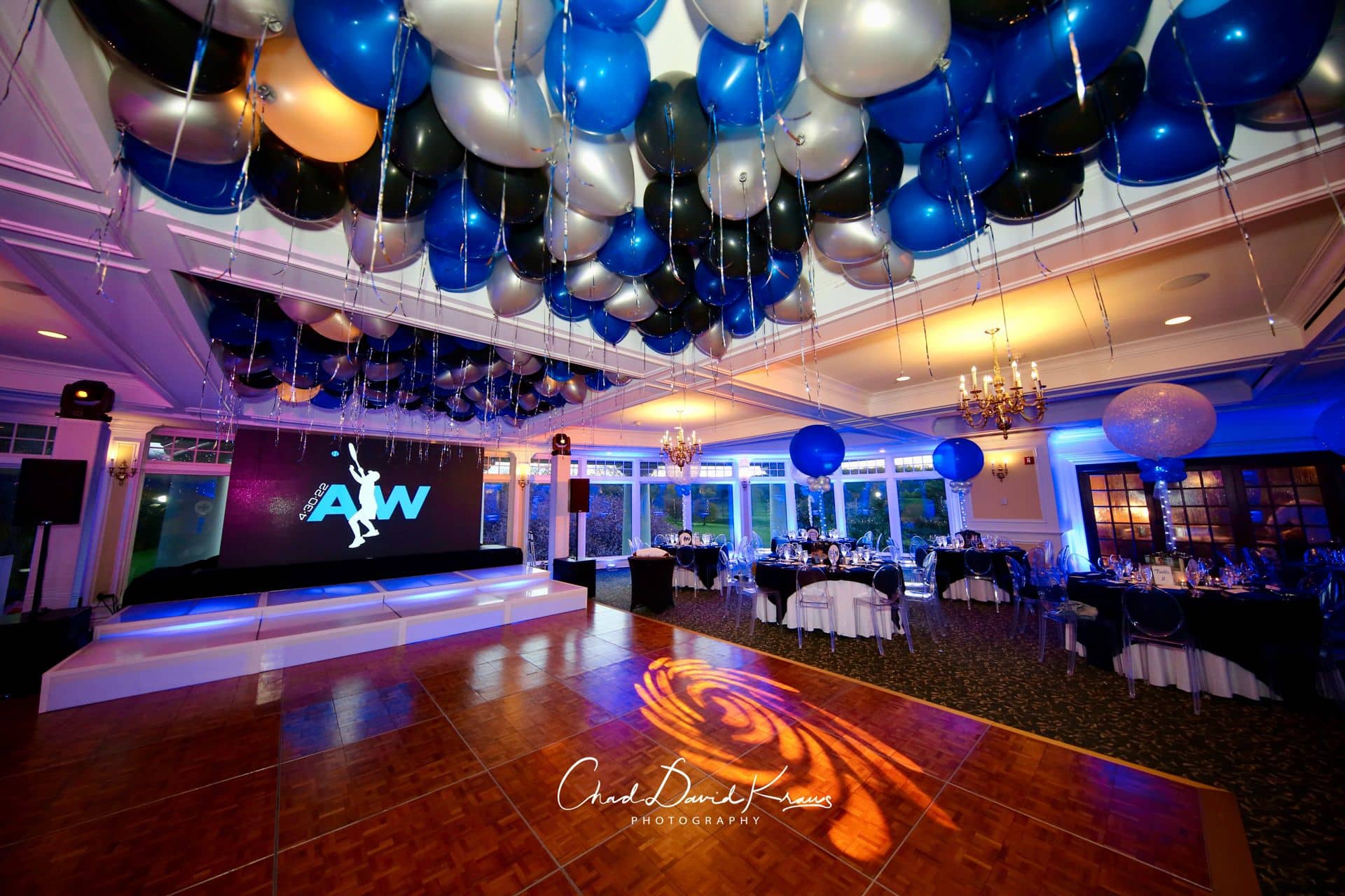 Tennis Themed Bar Mitzvah with Ceiling Balloons and Blue Uplighting at Scarsdale Golf Club