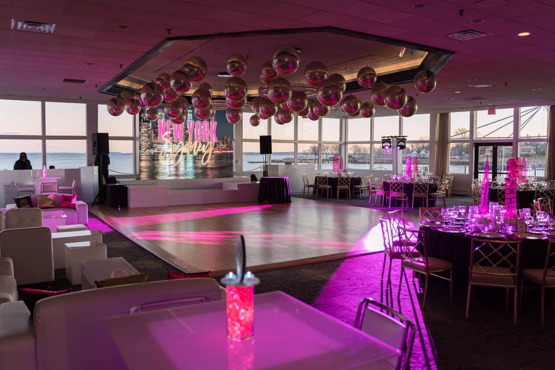 LED City Building Acrylic Cut Out Centerpieces, Mini Logo Table Toppers, and a Balloon Ceiling for a New York City Theme Bat Mitzvah at Mamaroneck Beach and Yacht Club