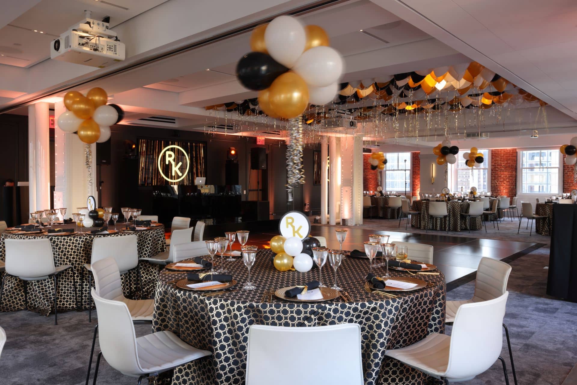 Gold, Black and White Graduation with Topiary Balloon Centerpieces and Loose Balloons over Dance Floor at Studio Gather, NYC