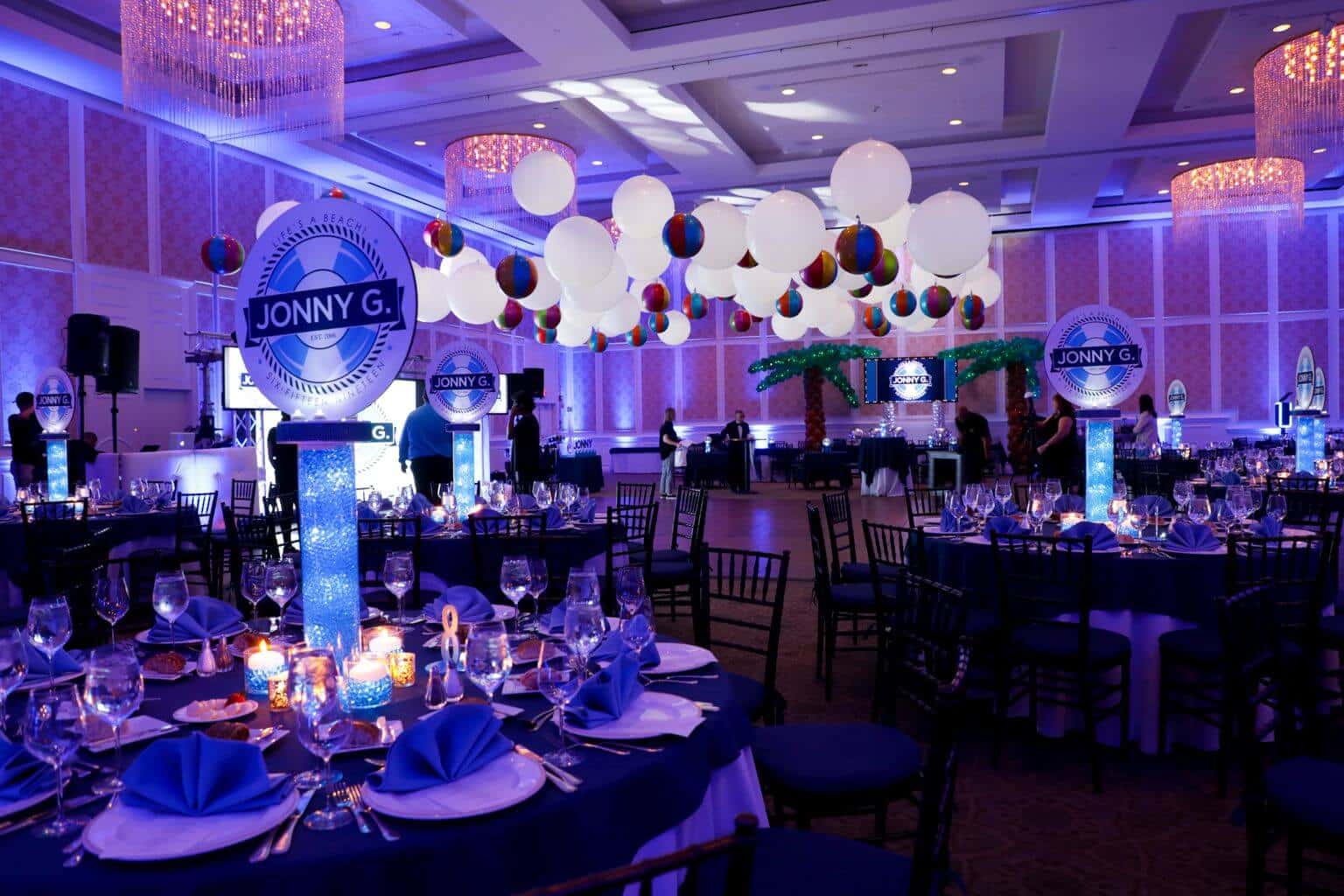 Beach Themed Bar Mitzvah with LED Balloons and Beach Balls over Dance Floor, LED Logo Centerpieces and Uplighting at Doral Arrowwood