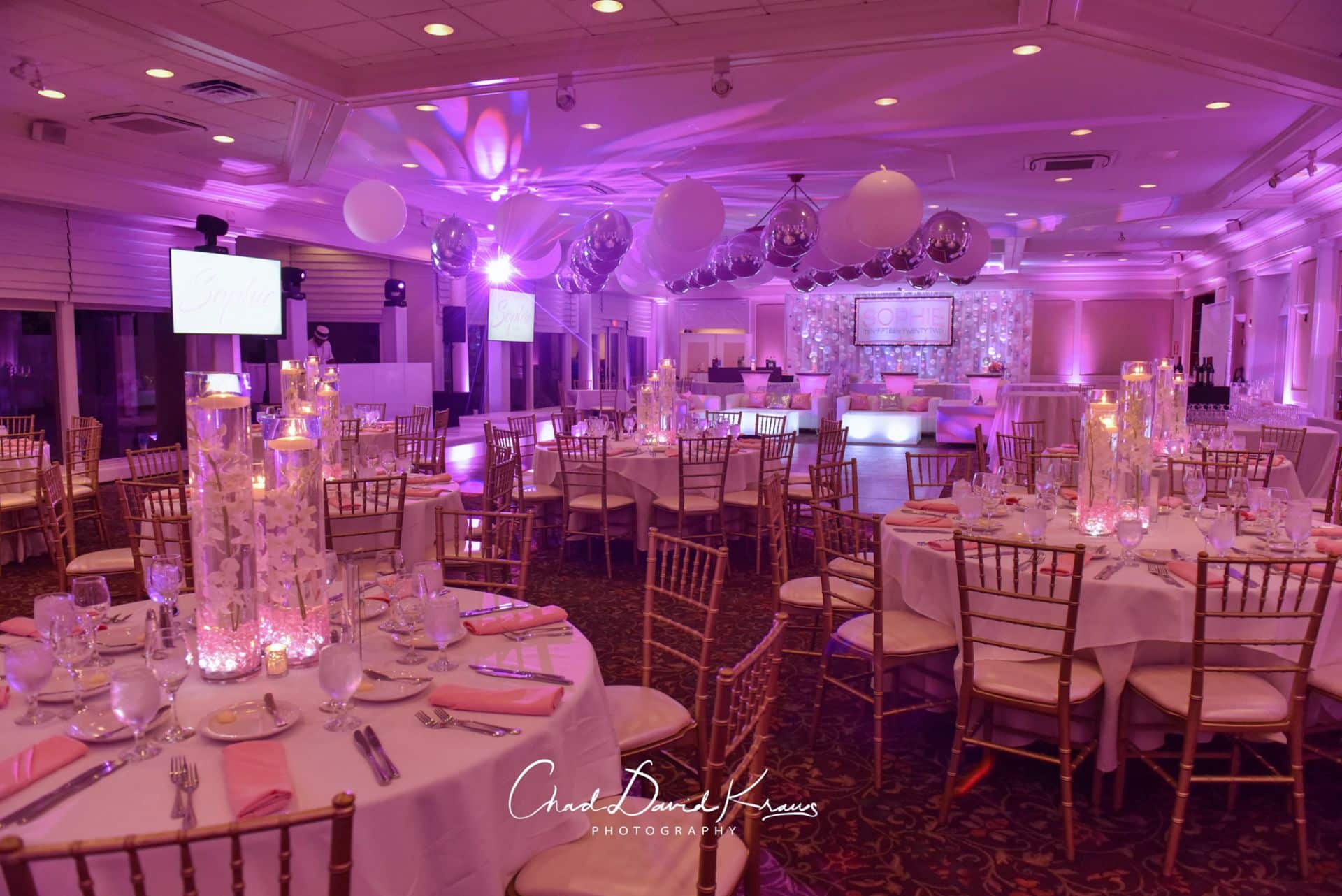 Pink Themed Event Decor with LED Orchid Centerpiece, Ceiling Balloons and Custom Lounge for Bat Mitzvah at Hampshire Country Club