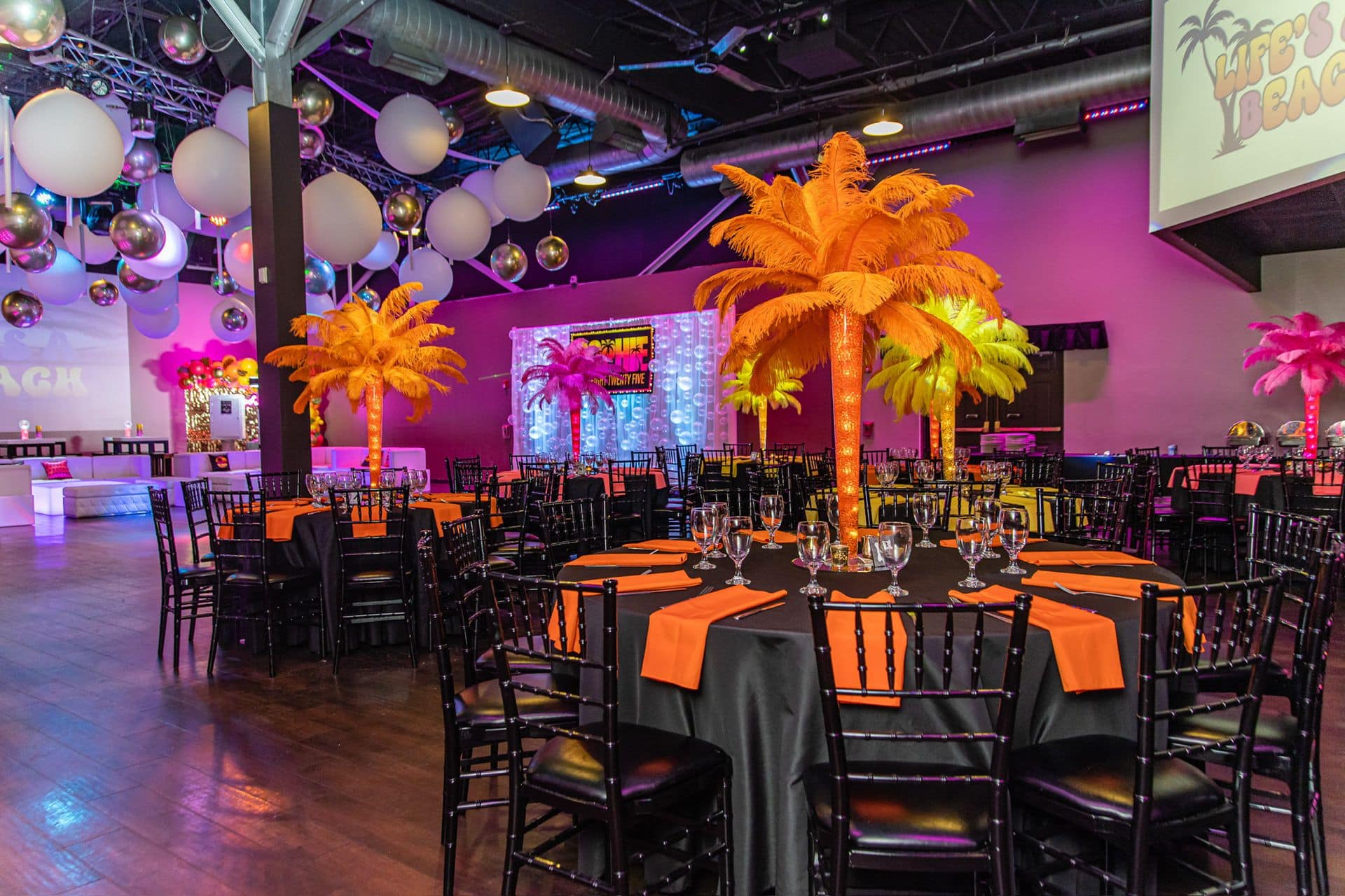 Feather Palm Tree Centerpieces, Custom Photo Booth, Balloon Ceiling and LED Bubble Wall with a Custom Backdrop for a Bat Mitzvah at Vibe