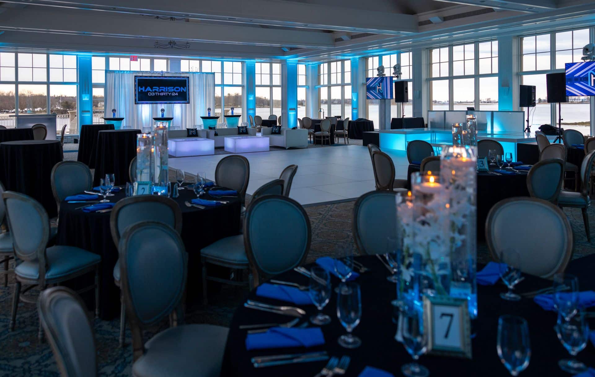 Orchid Centerpieces
and a Custom Lounge with Blue Uplighting at Beach Point Club in Mamaroneck