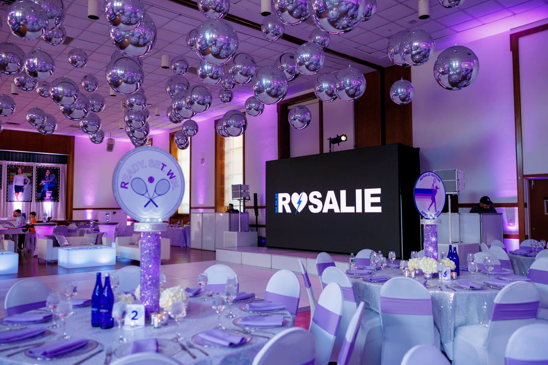 Tennis Theme Bat Mitzvah with Silver Metallic Orbs Ceiling, Custom Logo Topper Centerpieces, LED Lounge and White Dance Floor at Temple Israel Center, White Plains