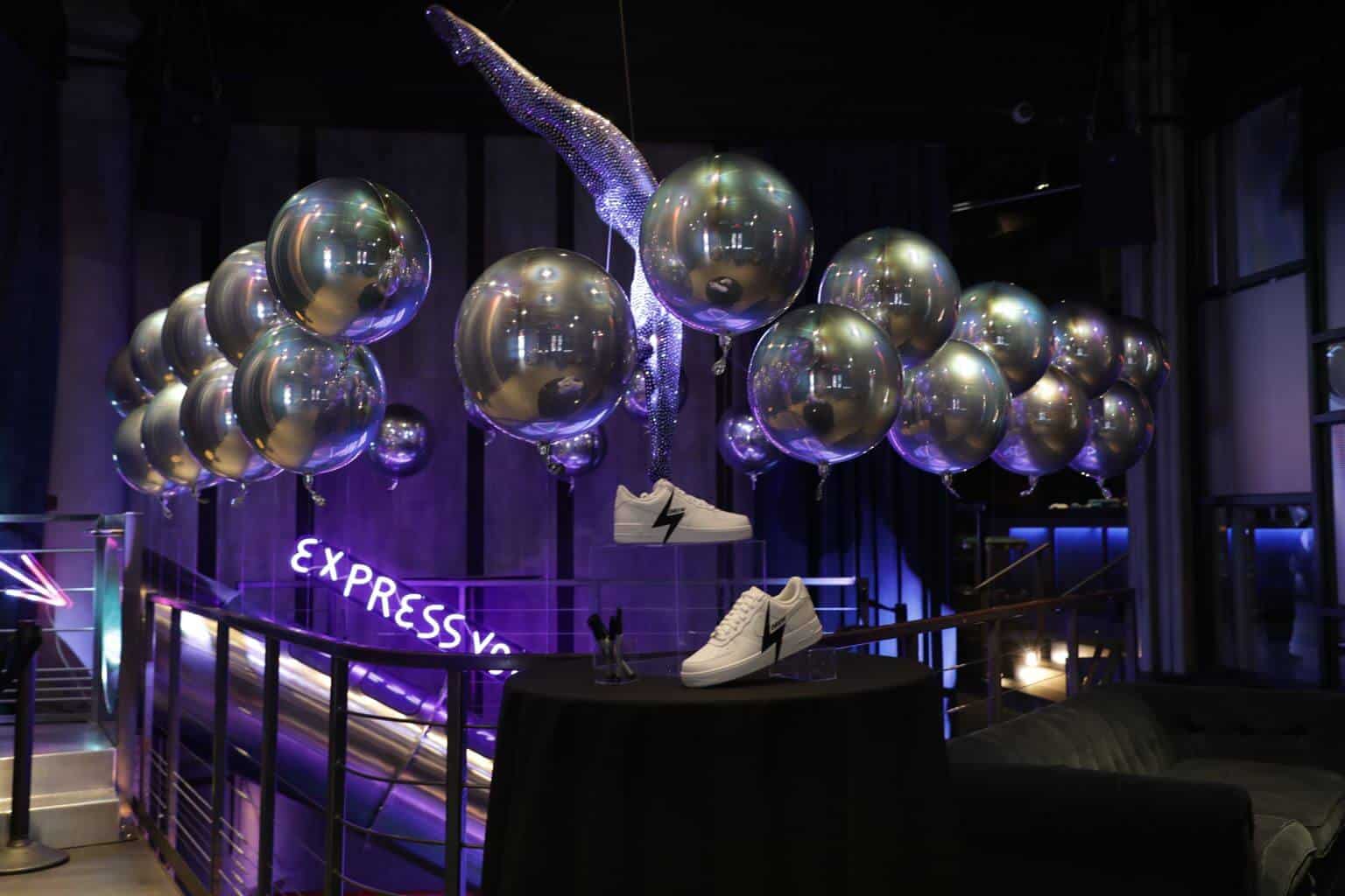 Silver Orbz Balloon Scape on Railing at Slate, NY