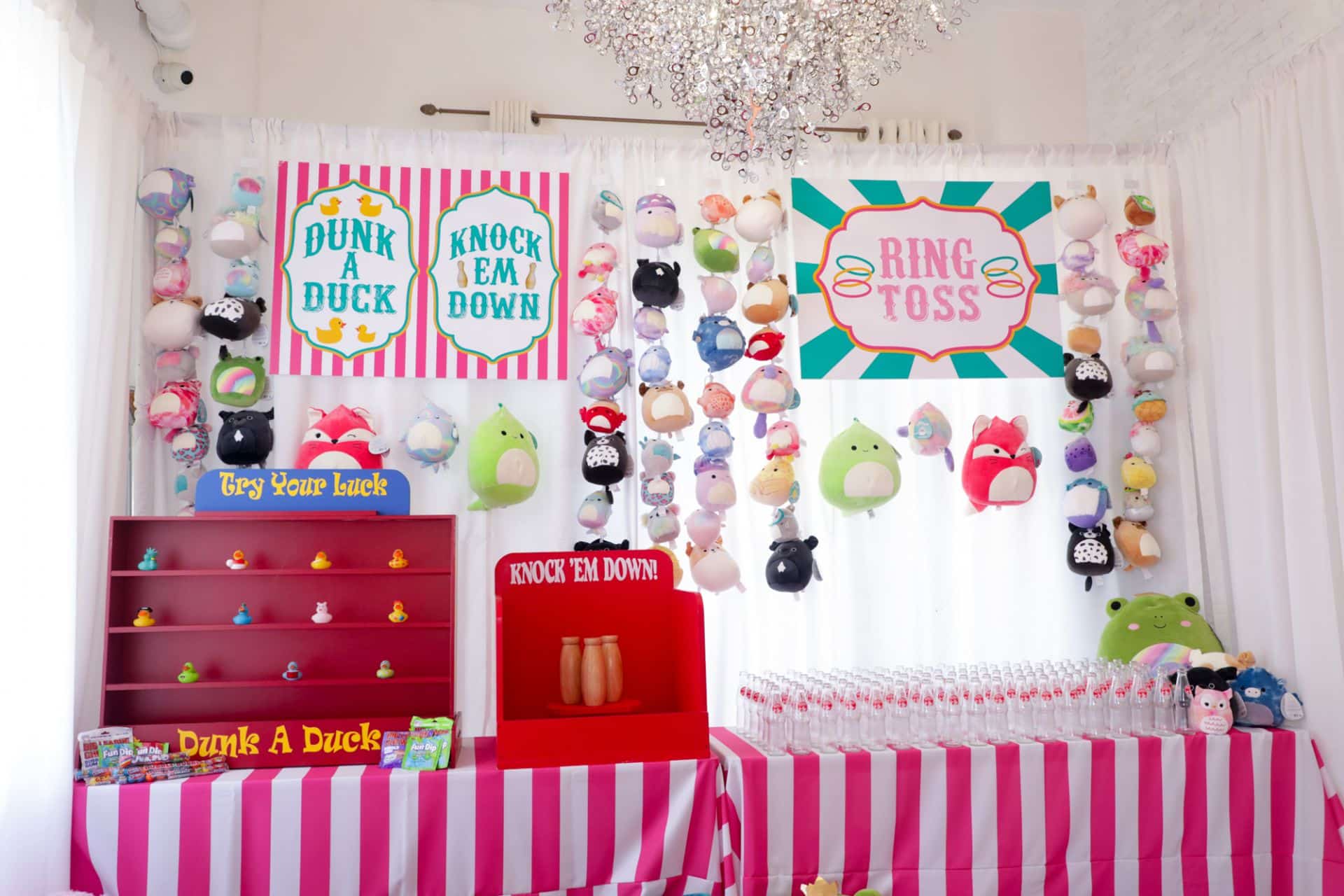 Custom Carnival Game Booth Setup with Pipe and Drape, Signage and Squish Mallows for Bat Mitzvah at Midtown Loft