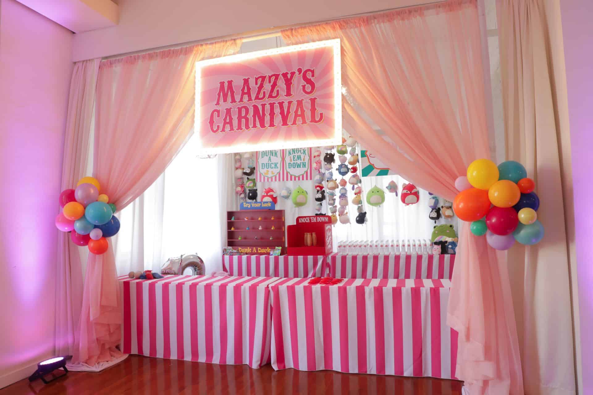 Carnival Booth Setup with Pink Draping and Marquee Sign for Bat Mitzvah at Midown Loft