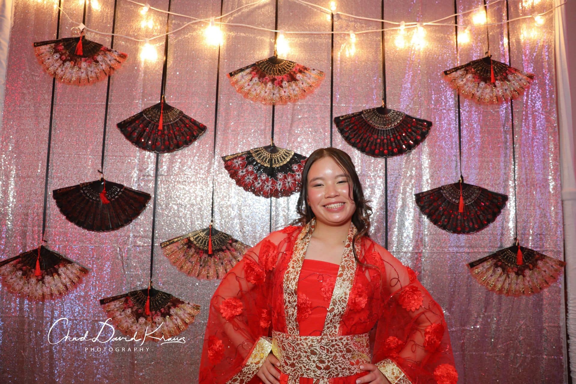 Asian Themed Photo Booth Backdrop with Silver Bling and Hanging Fans for Bat Mitzvah