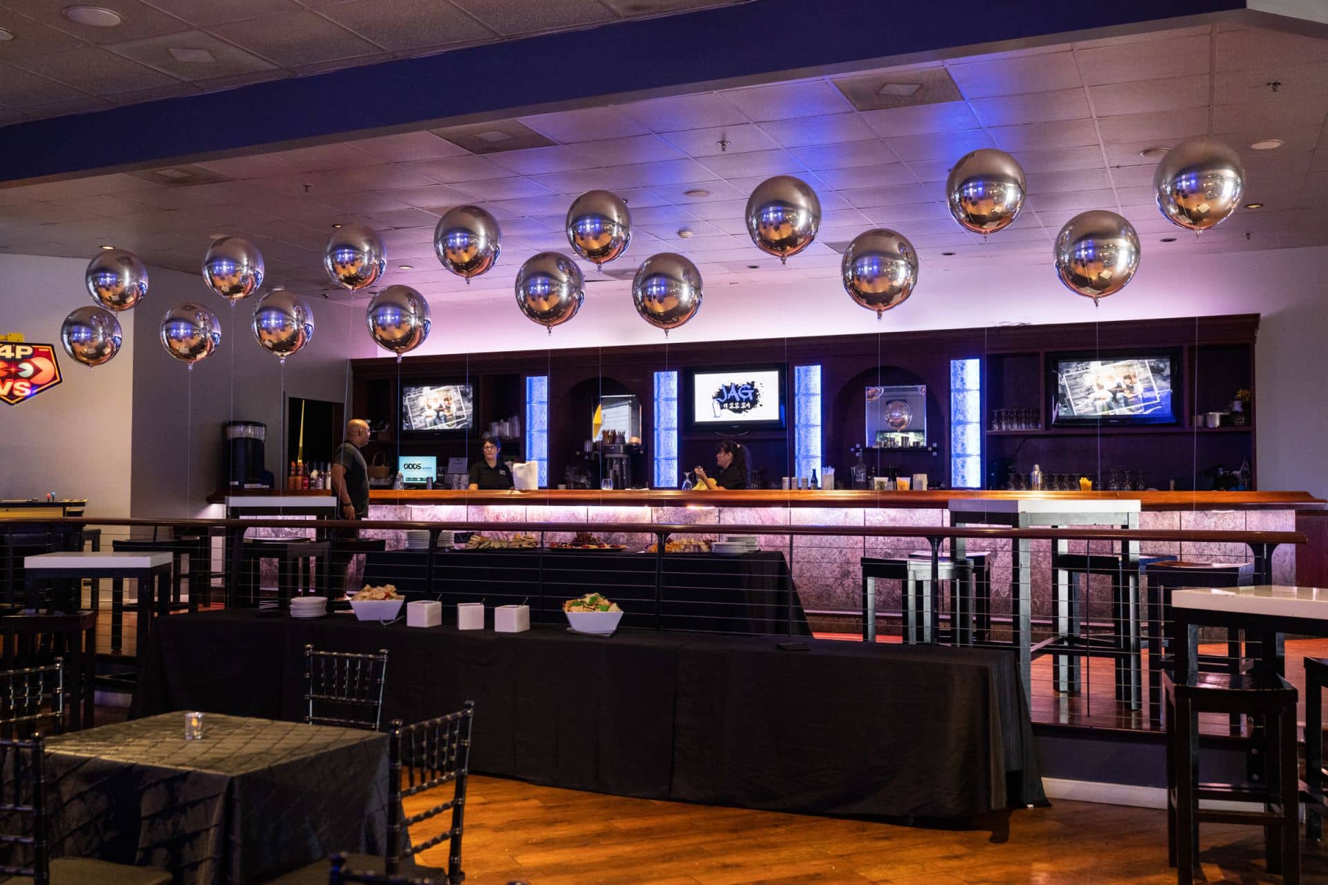 Silver Metallic Orbs Decor on Railing at Vibe