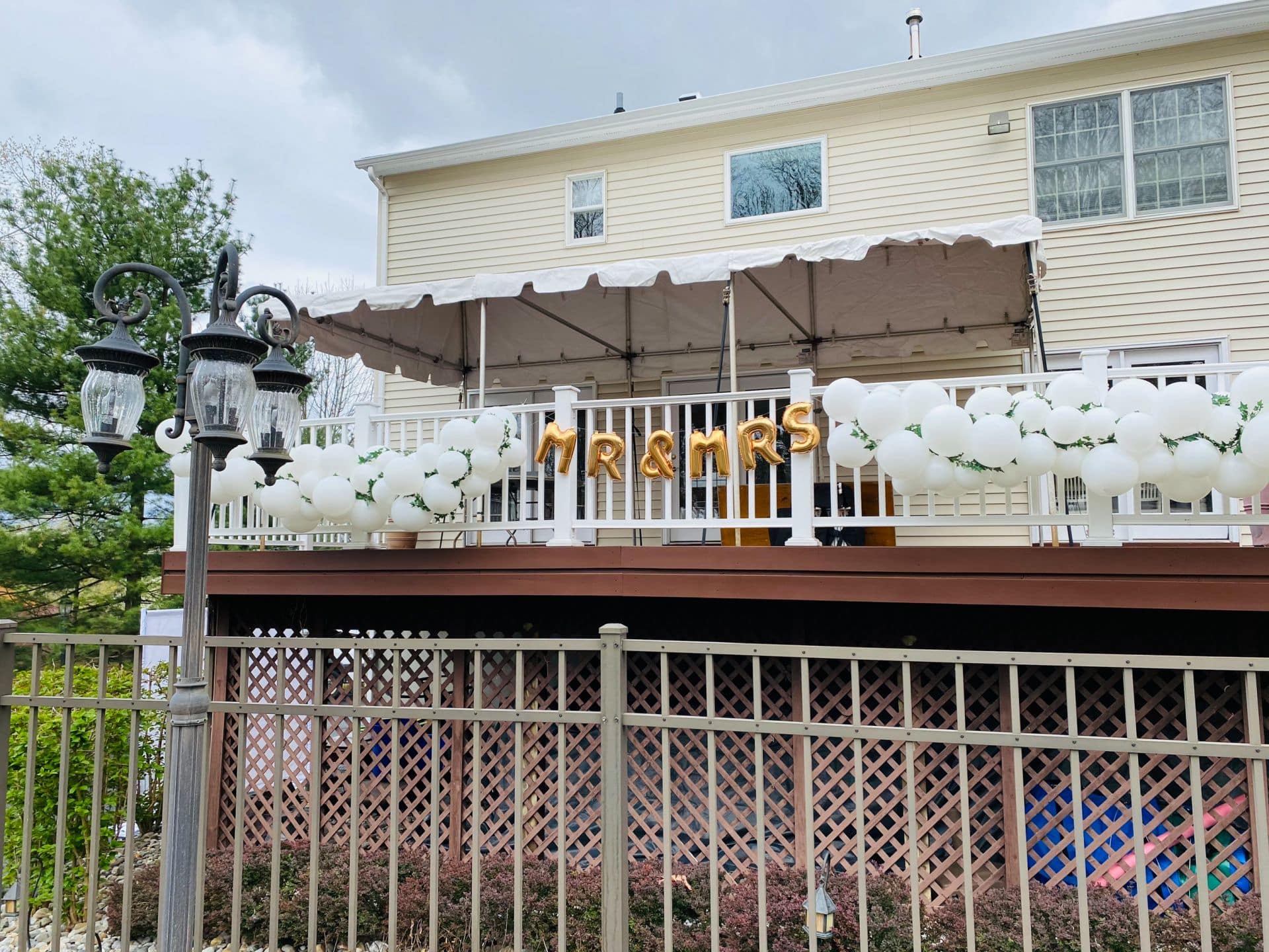 Mylar Name Balloon Around Fence with Ballon Garland for Wedding
