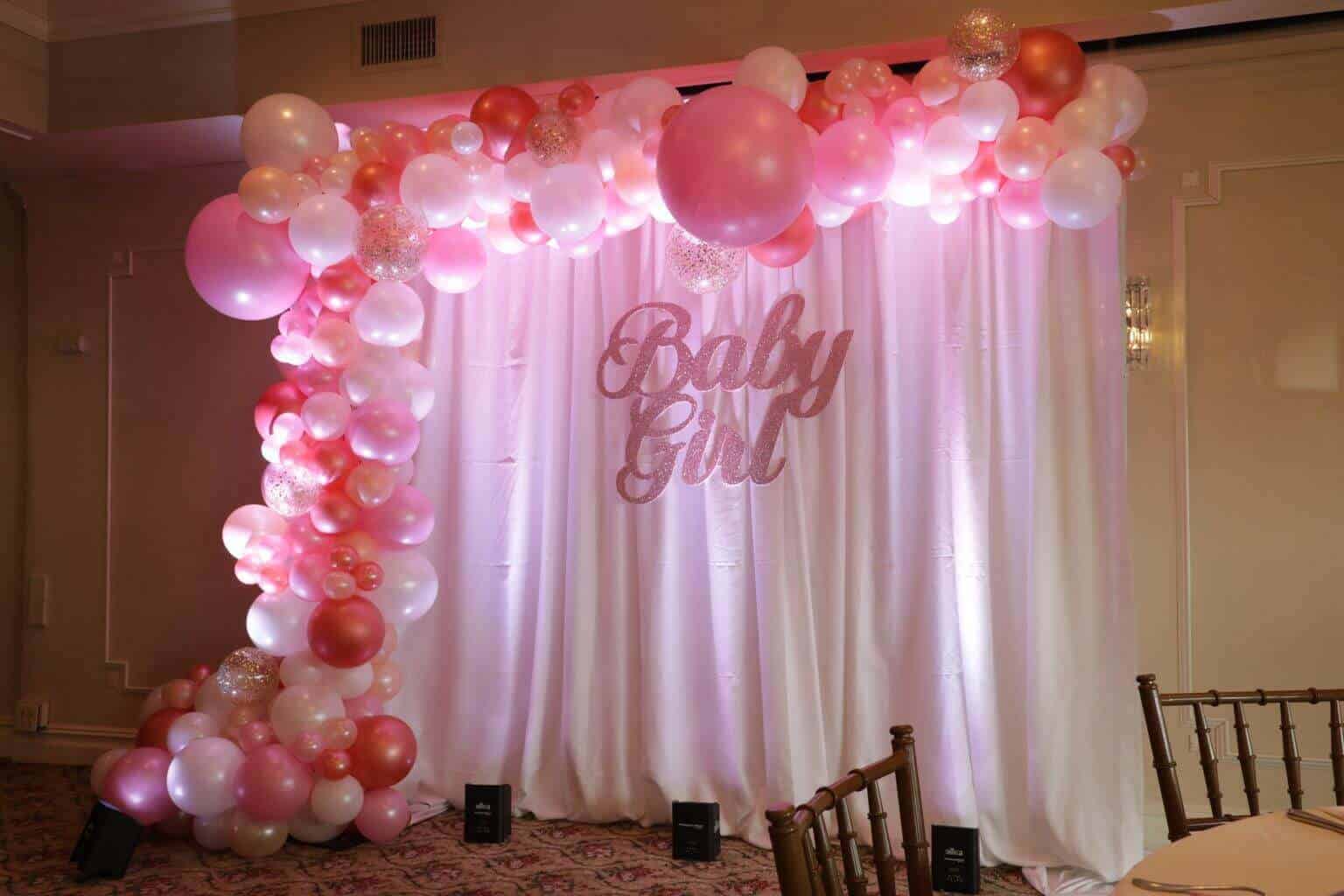 Rose Gold Organic Balloon Arch with Gold Glitter Balloons and Custom LED Backdrop