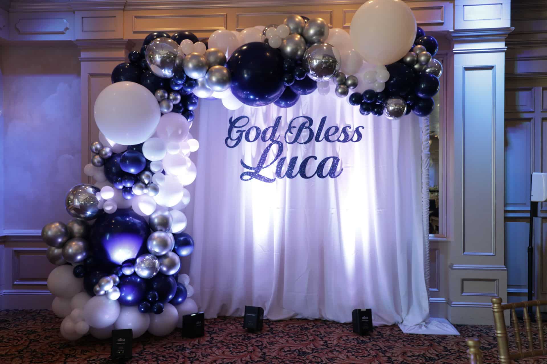 Navy and White Organic Half Arch over Backdrop With Custom Sign