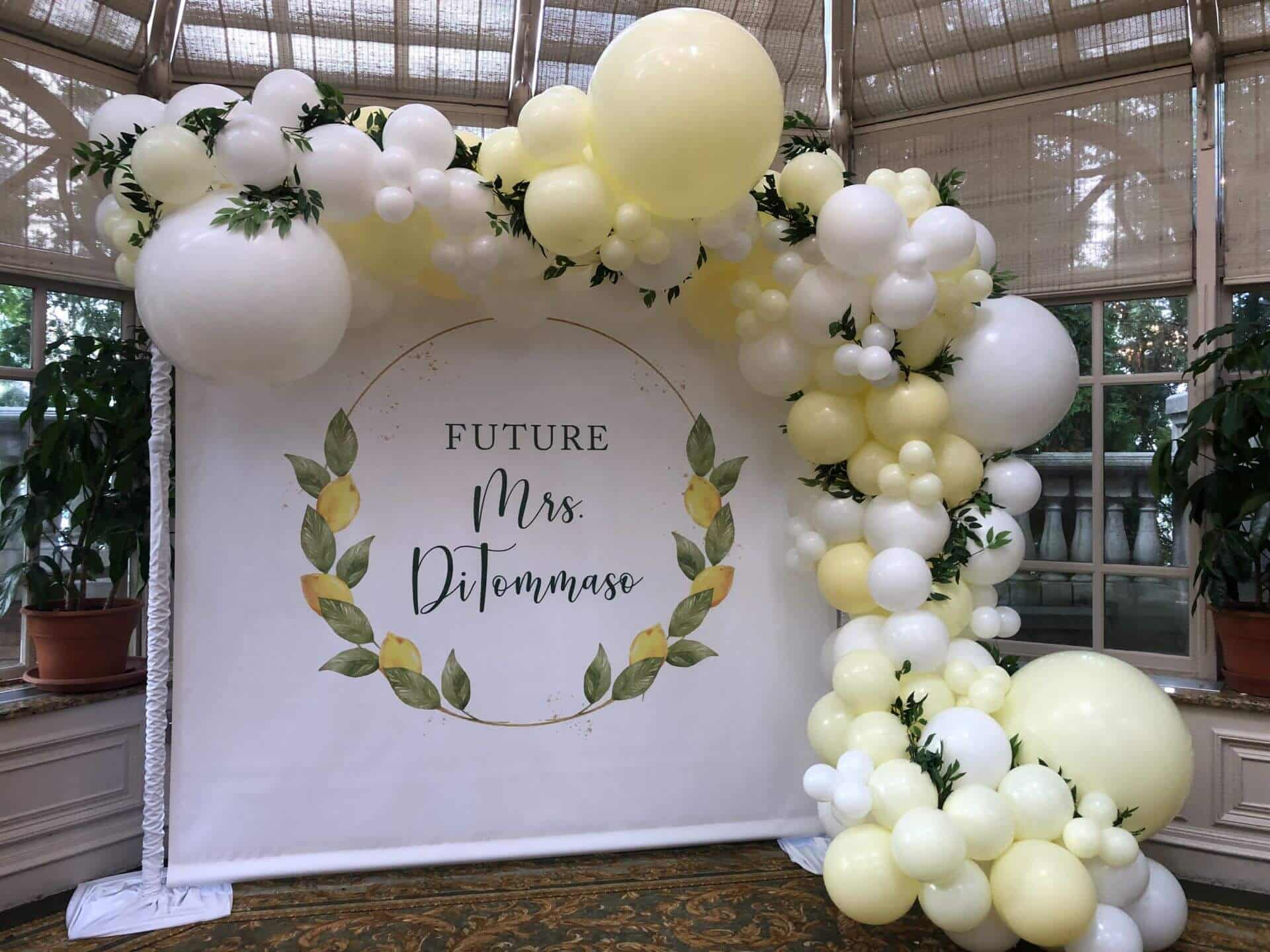 White andIvory Organic Balloon Garland with Greenery and Custom Logo Backdrop for Bridal Shower