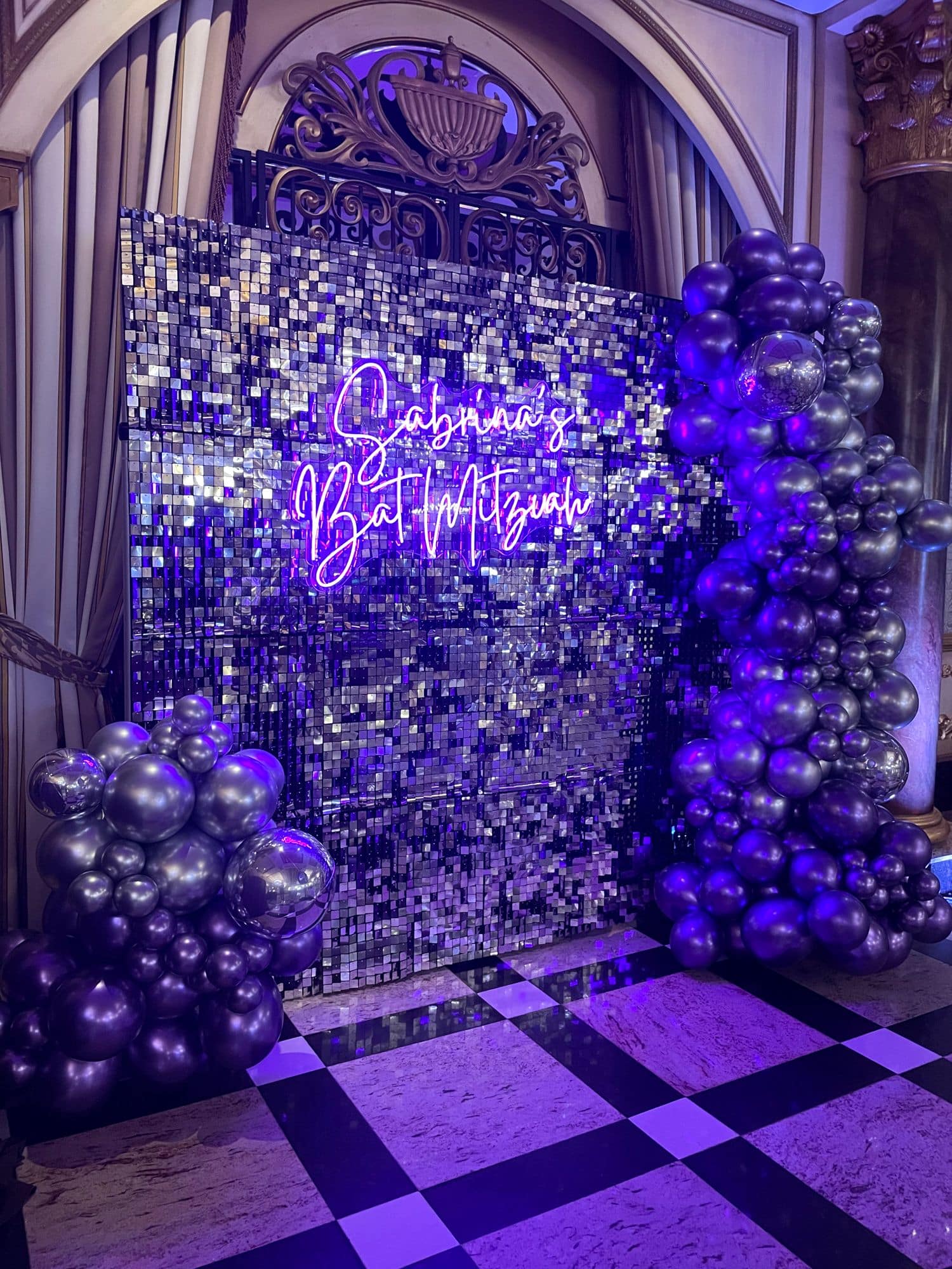 Purple and Silver Metallic Balloon Garland with Silver Shimmer Wall and Neon Sign for Bat Mitzvah Photo Booth