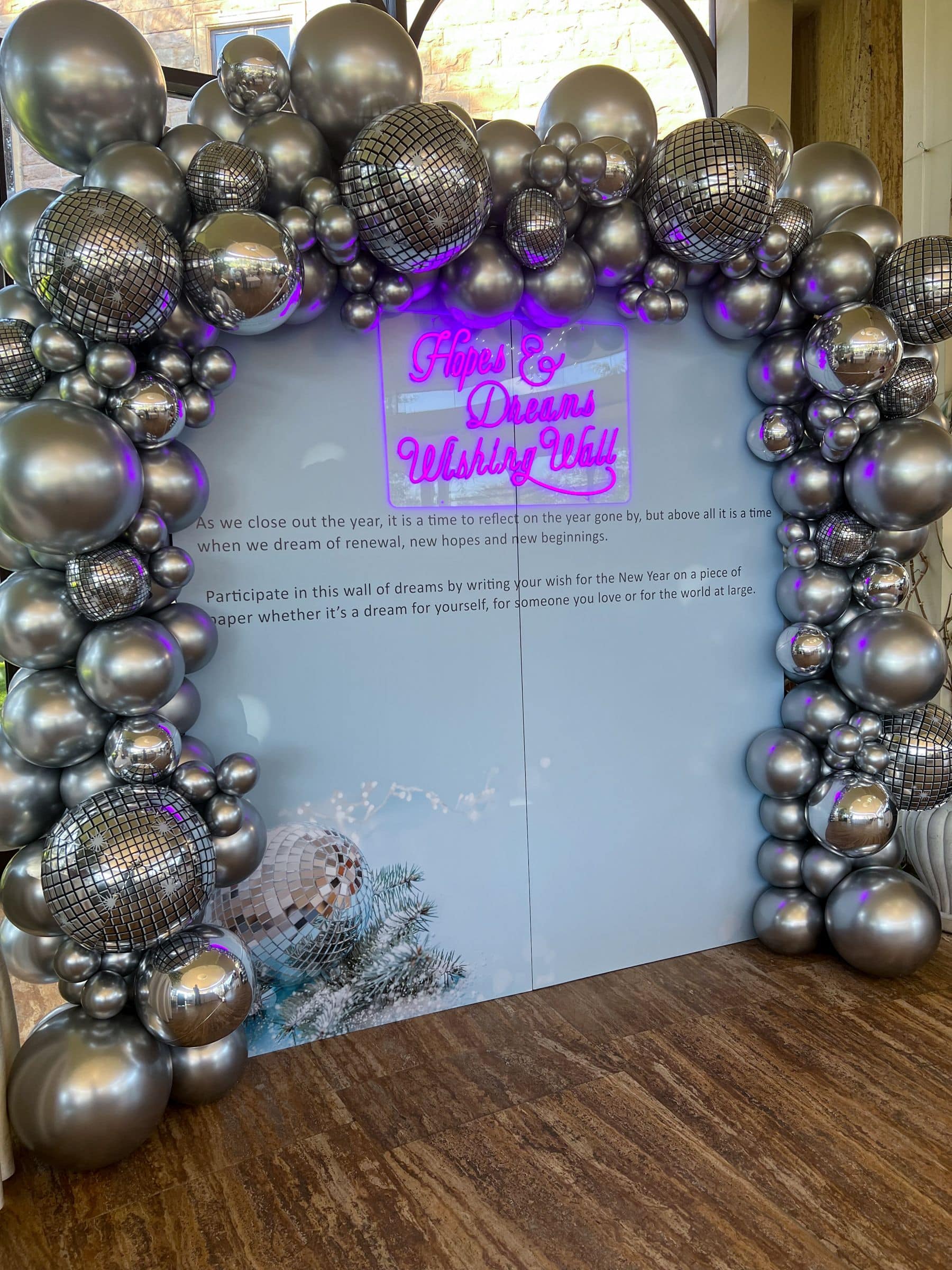 Silver Disco Balloon Balloon Arch over Photo Backdrop