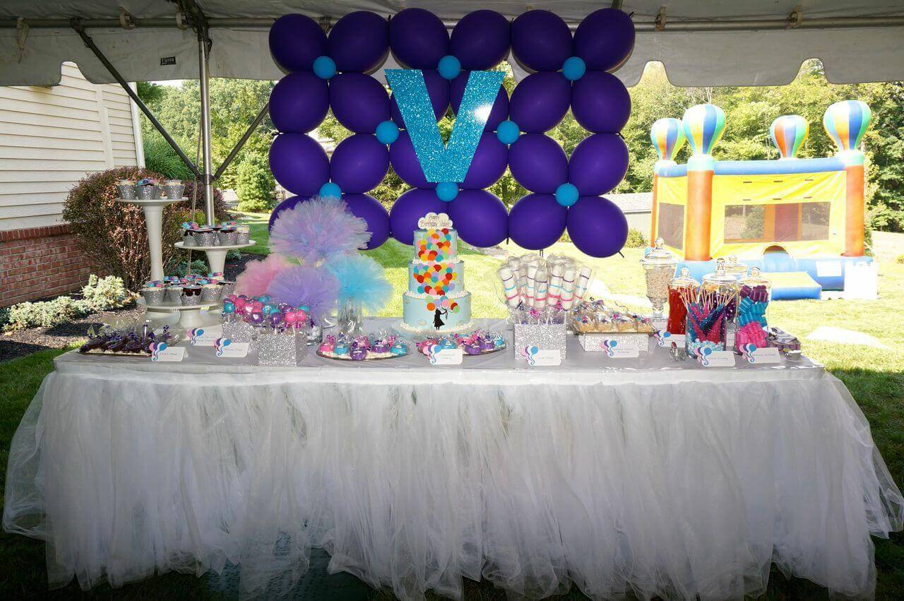 Custom Balloon Wall with Sparkly Initial Behind Candy Bar Display