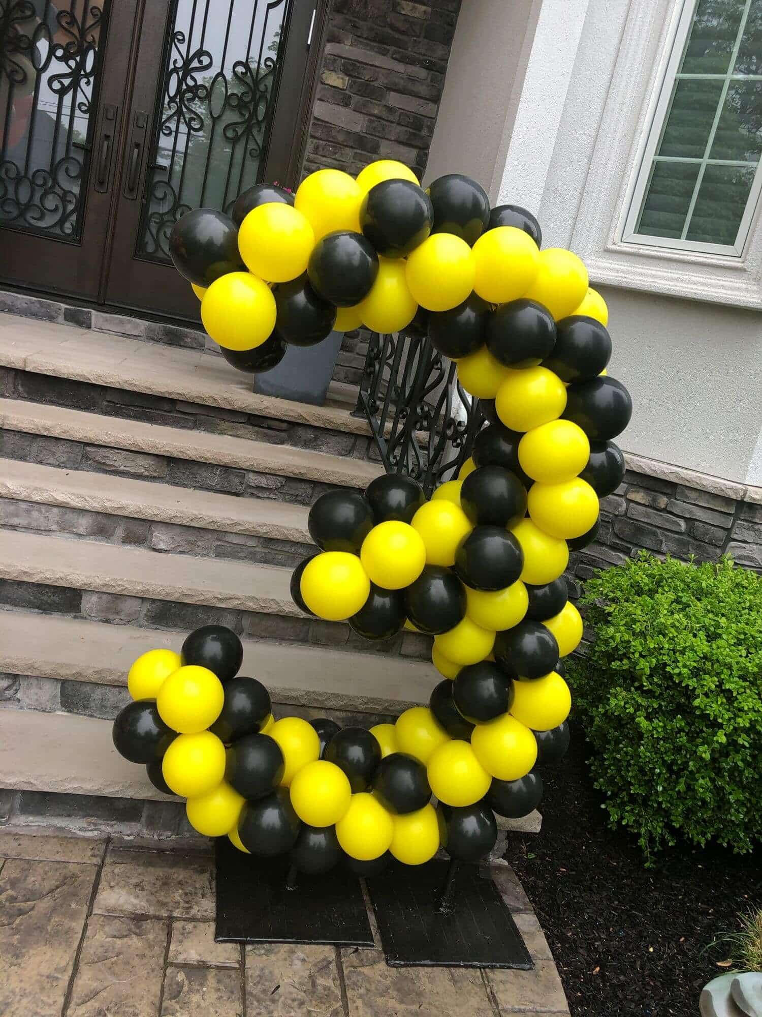 Black and Yellow Balloon Number Sculpture for Construction Themed Birthday