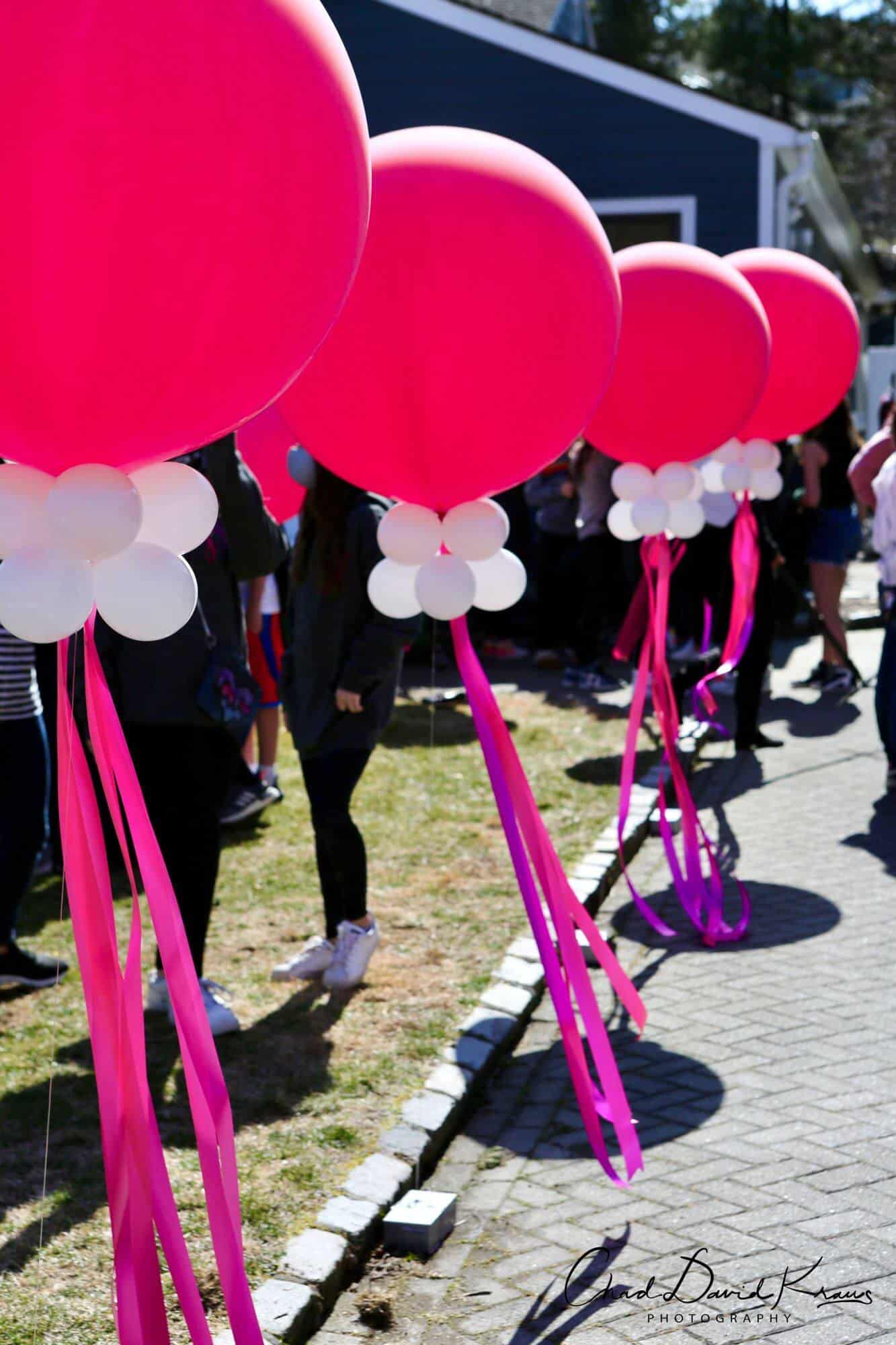 Large Free Standing Balloons with Tassels Around Driveway