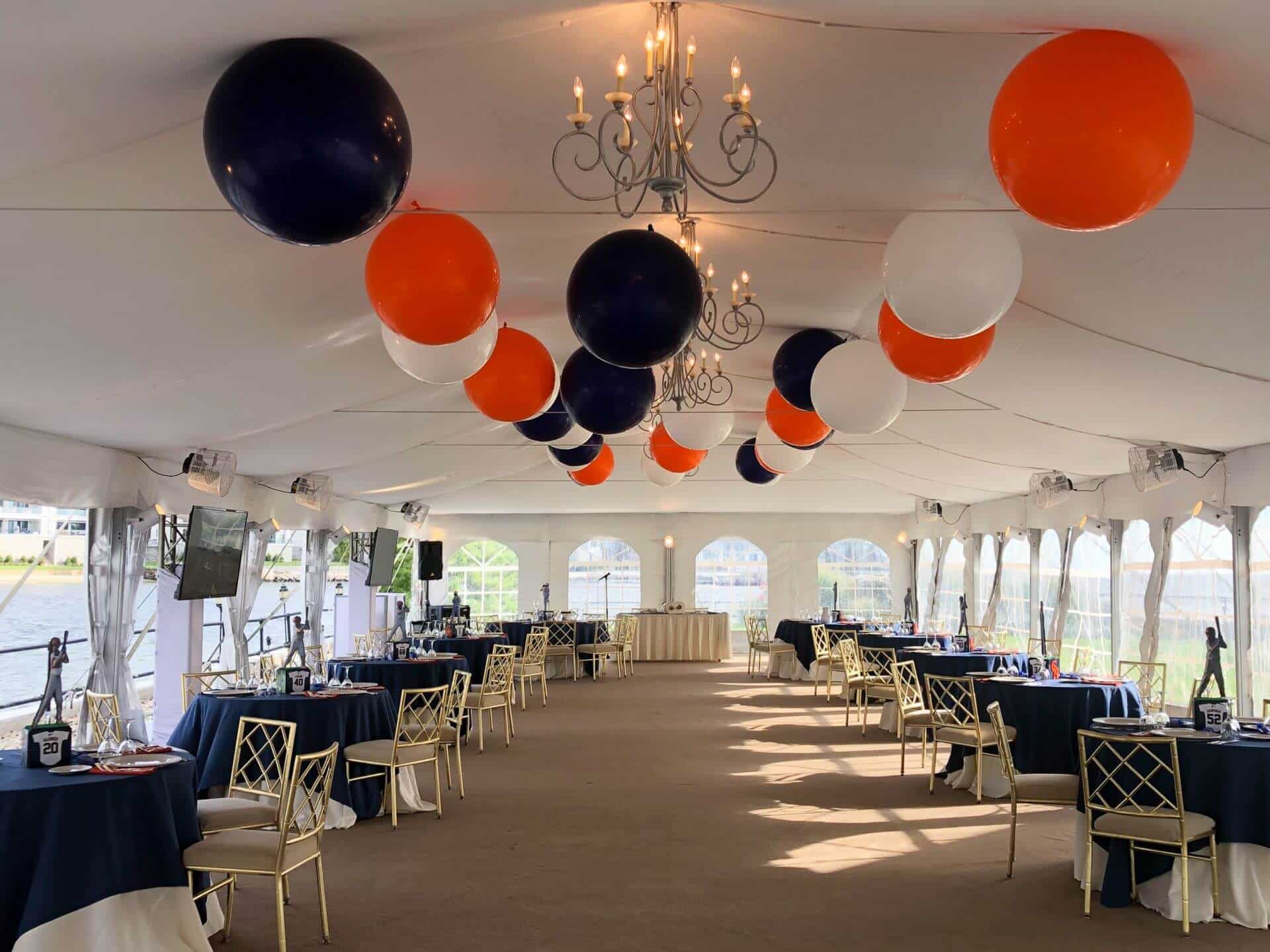 Navy and Orange Ceiling Balloons in Tent for Outdoor Bar Mitzvah at Glen Island Harbour Club