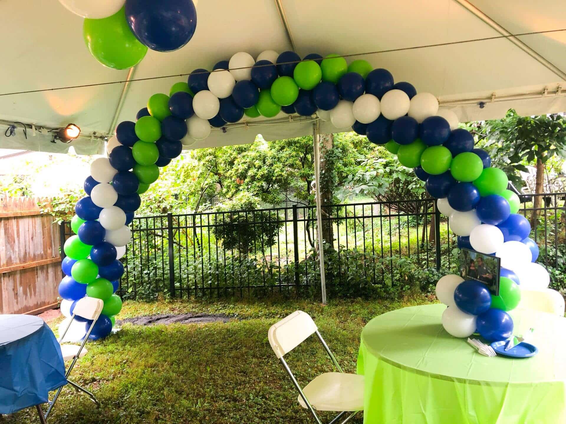 Blue and Green Balloon Arch in Outdoor Tent For Bar Mitzvah Celebration
