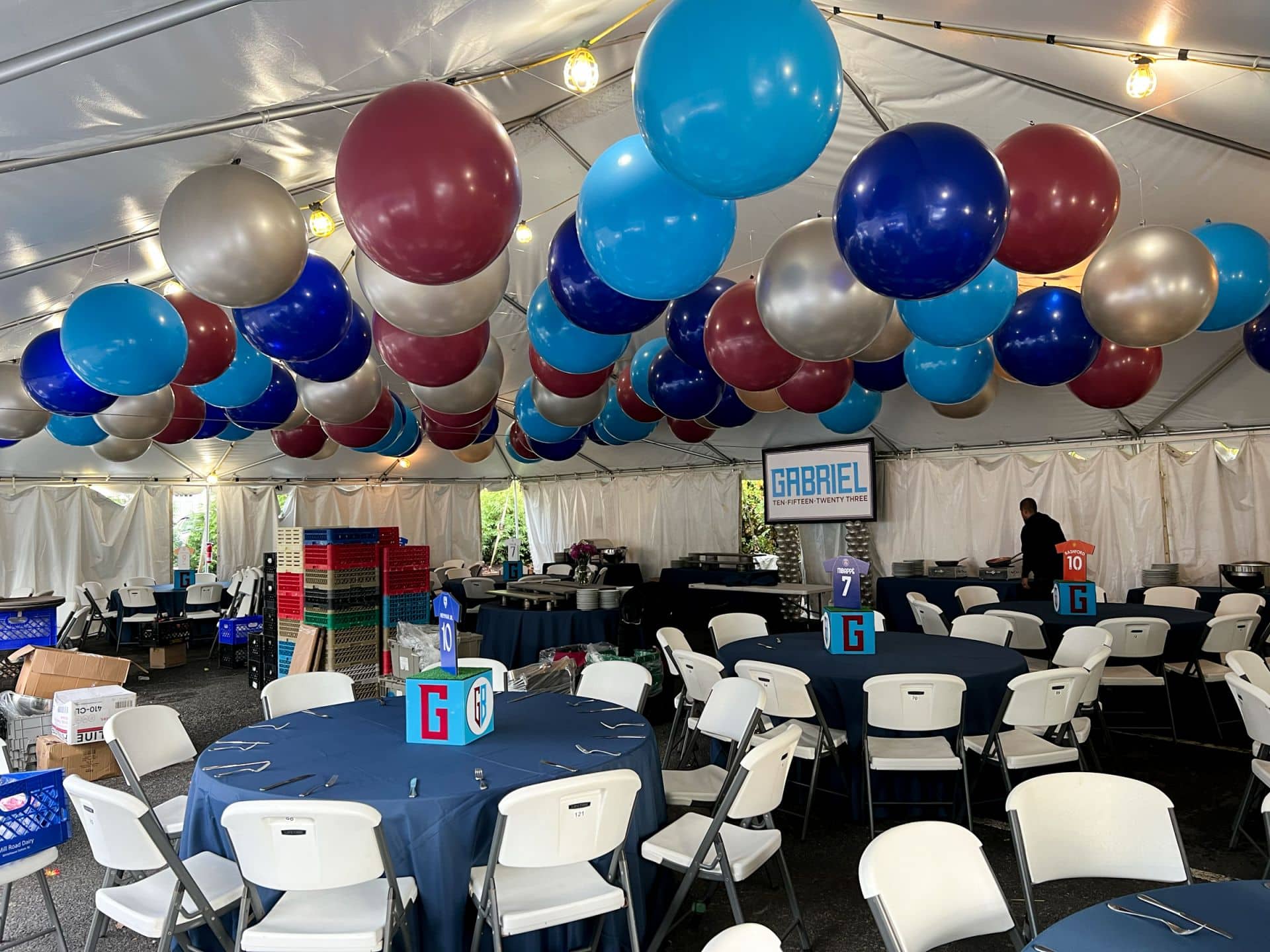 Shades of Blue and Burgundy Ceiling Balloons in Tent for Outdoor Bar Mitzvah