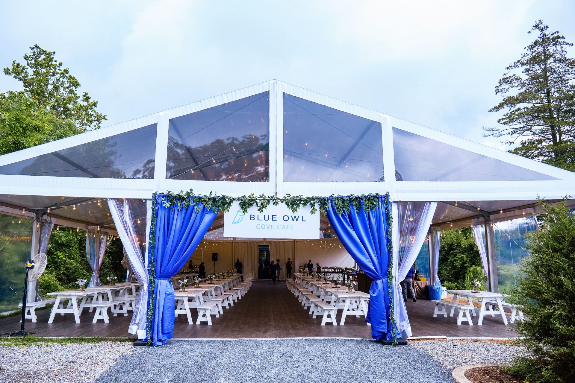 Custom Entrance Sign with Custom Draping and Greenery Accent for Tent Corporate Event