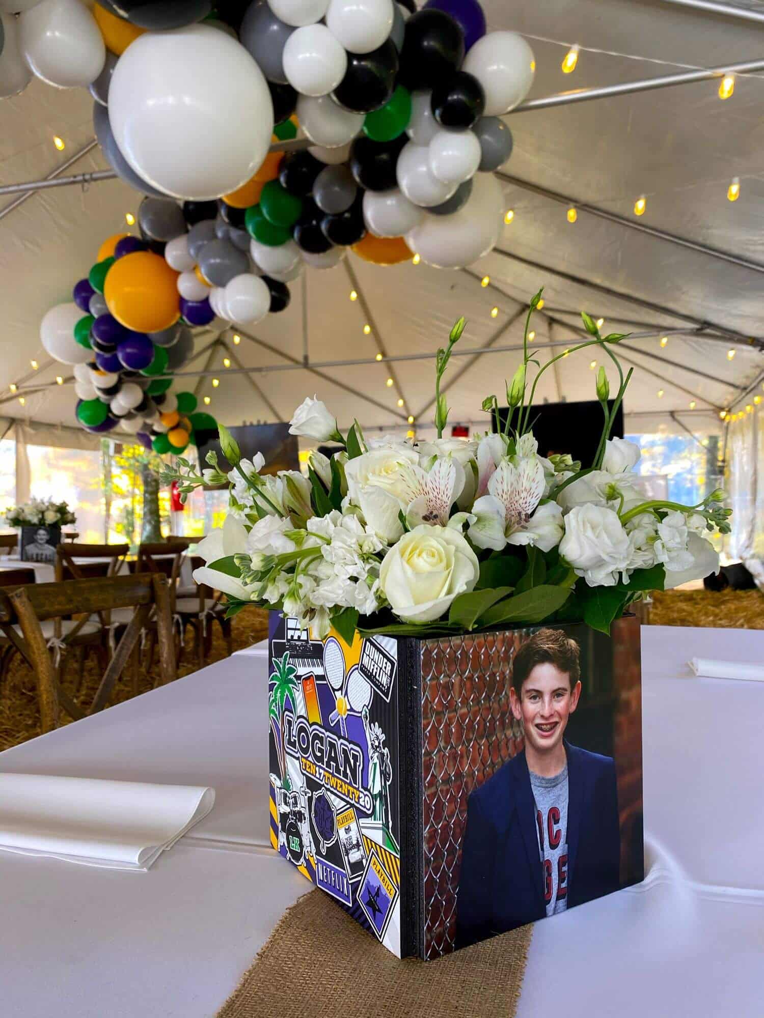 Photo and Logo Cubes with Florals for Rustic Bar Mitzvah in Outdoor Tent