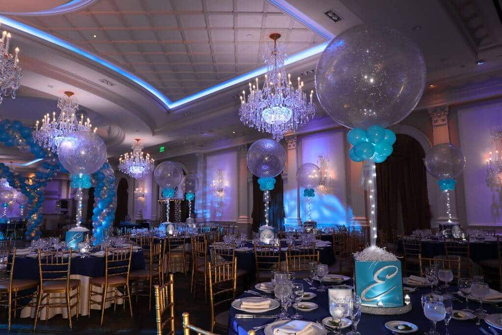 Swim Themed Photo Cube Centerpieces with Silver and Turquoise Sparkle Balloons and Lights