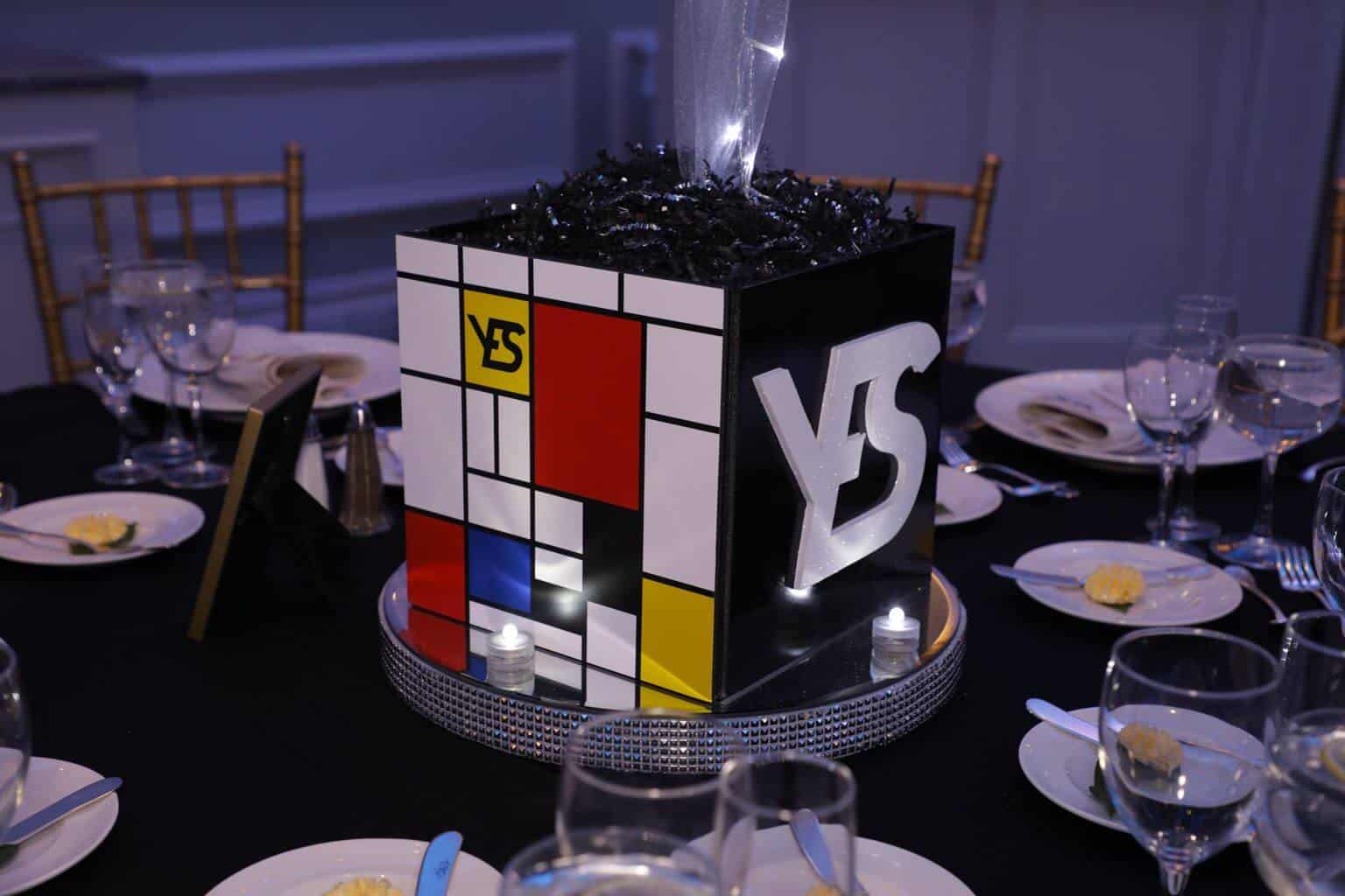 Mondrian Themed Cube Centerpiece with Cutout Initials and Custom Logo